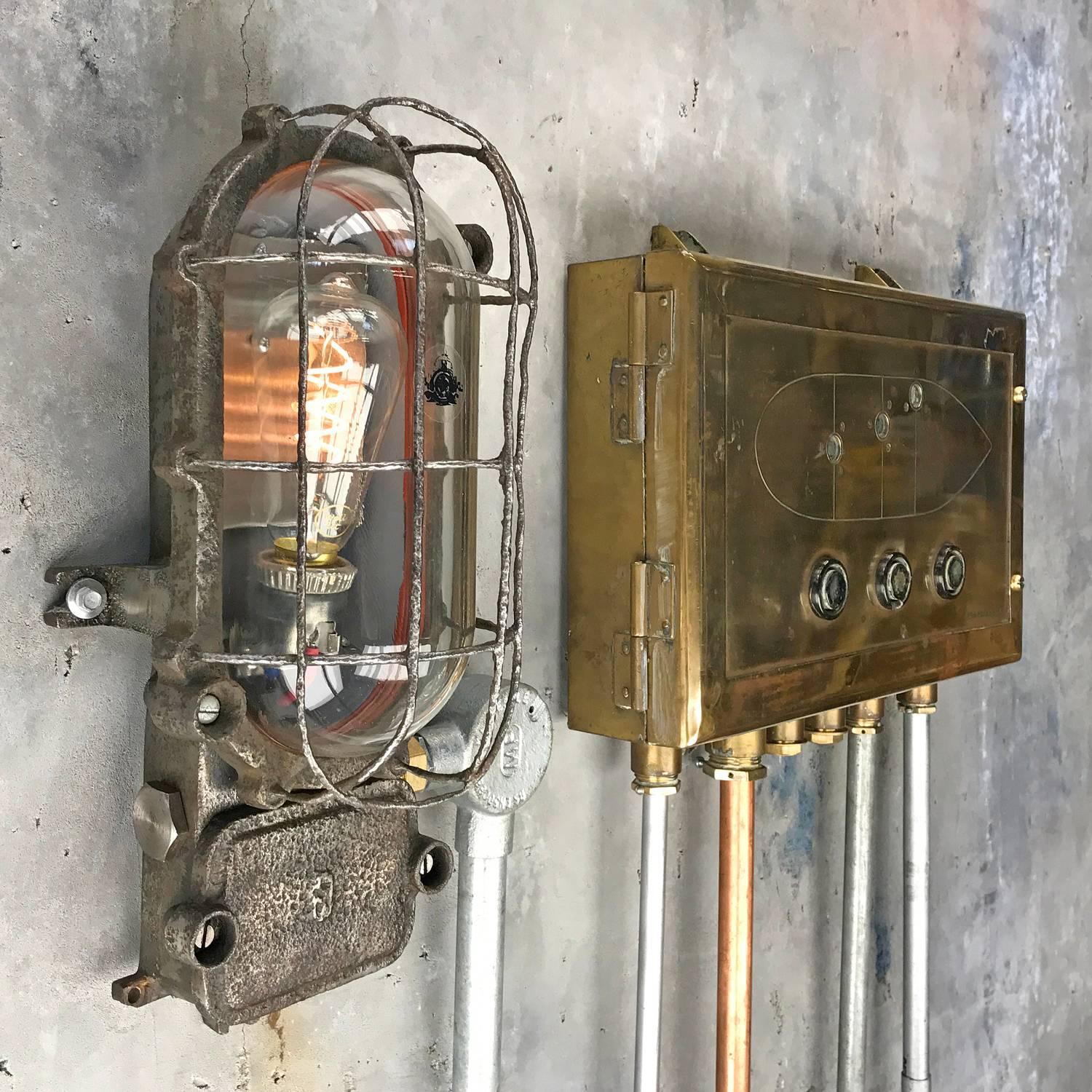 1960s, heavy cast iron wall light originally used in hazardous areas in factories.

The pitted iron appearance gives a great patina of age; these lights are fitted with flexi filament dimmable LED Edsion bulbs.

Dimensions:

Width 150