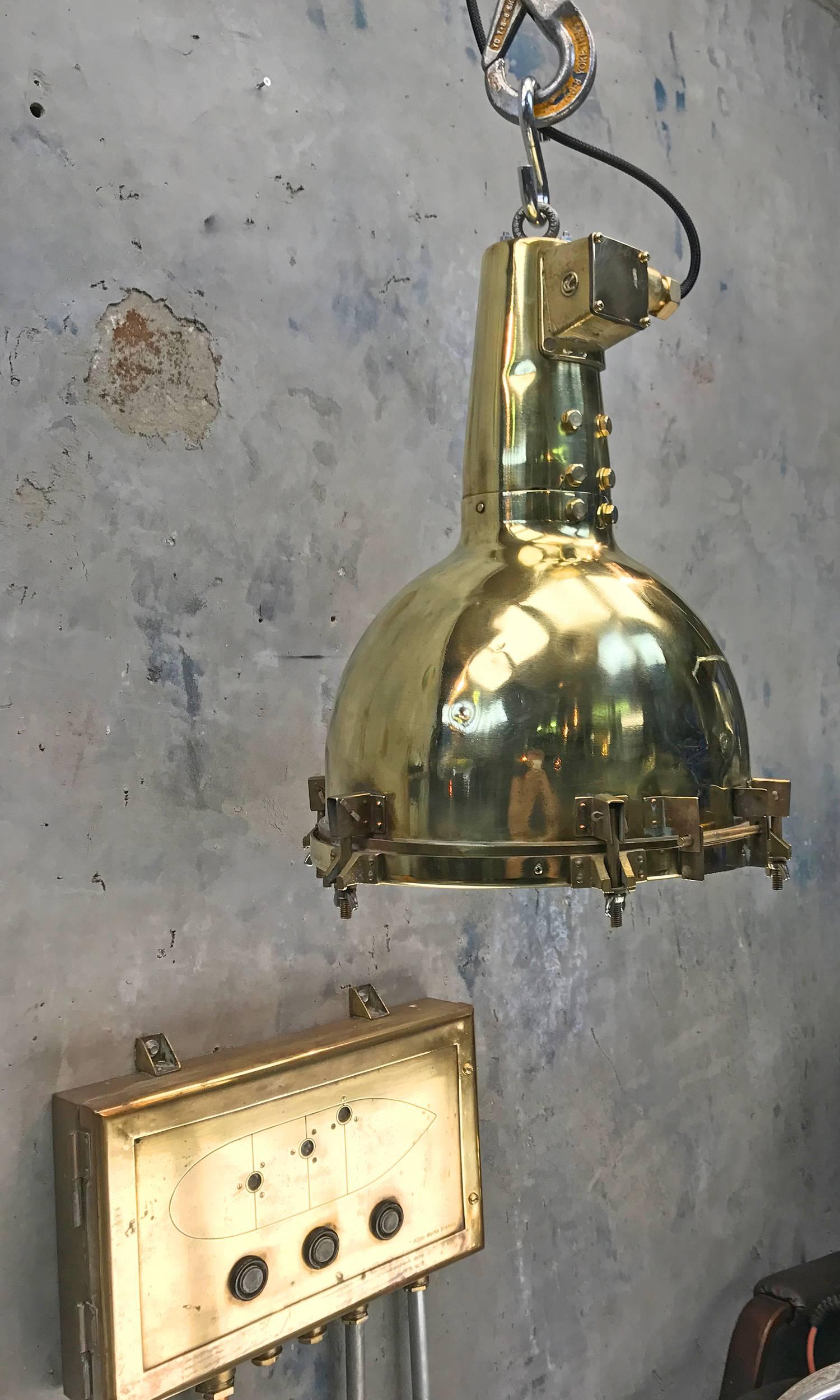 This very substantial fitting was salvaged from an old Japanese cargo ship built during the 1970s, These lights have travelled one million miles at sea!

We have expertly converted the search light to be a pendant for down lighting areas such as
