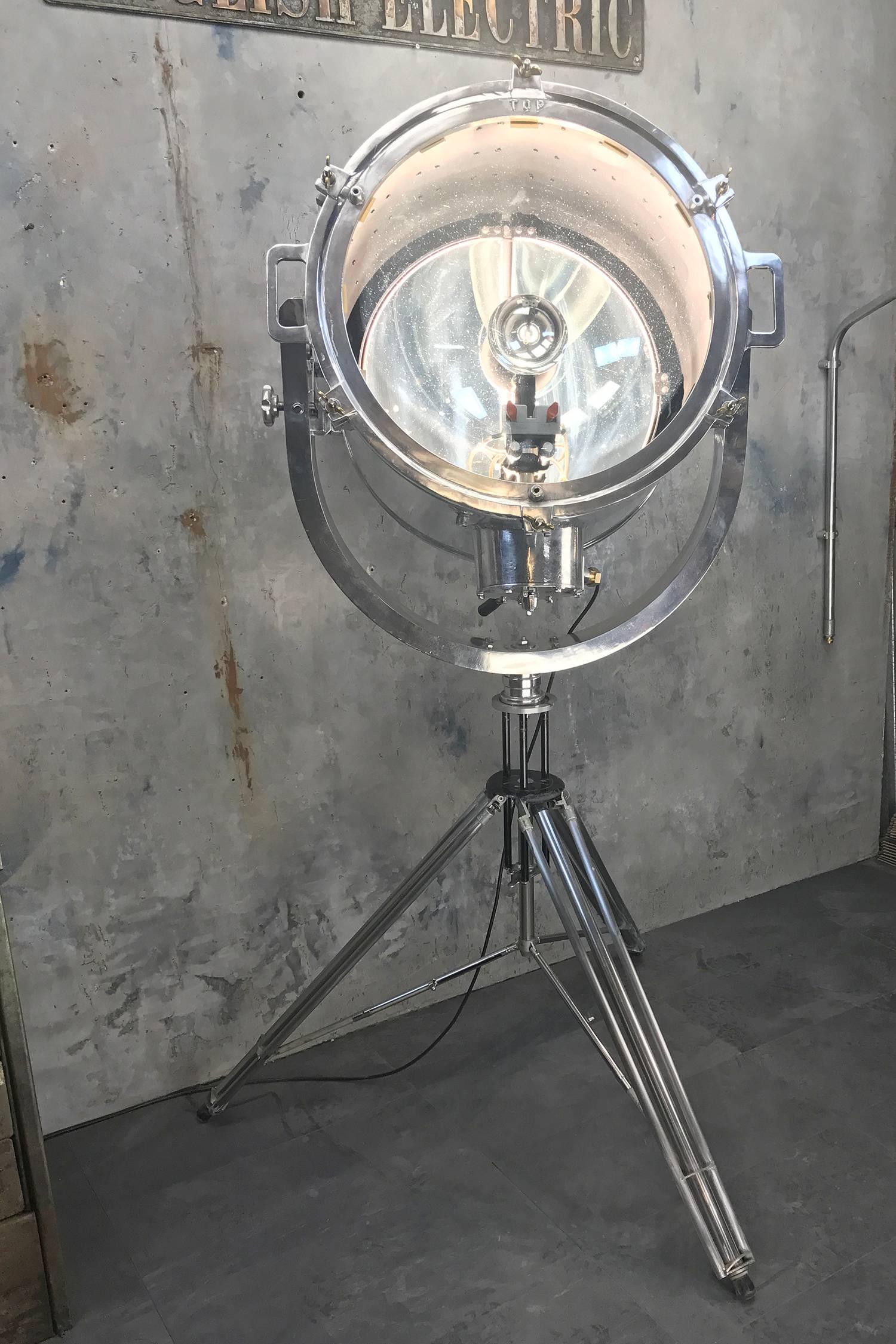 Shonan kosakusho ltd Industrial searchlight tripod.

Manufactured in Japan circa 1982 this fixture would have been used on supertankers as a ship to shore Luminaire.

There are some fantastic mechanical features including a lamp loader which is