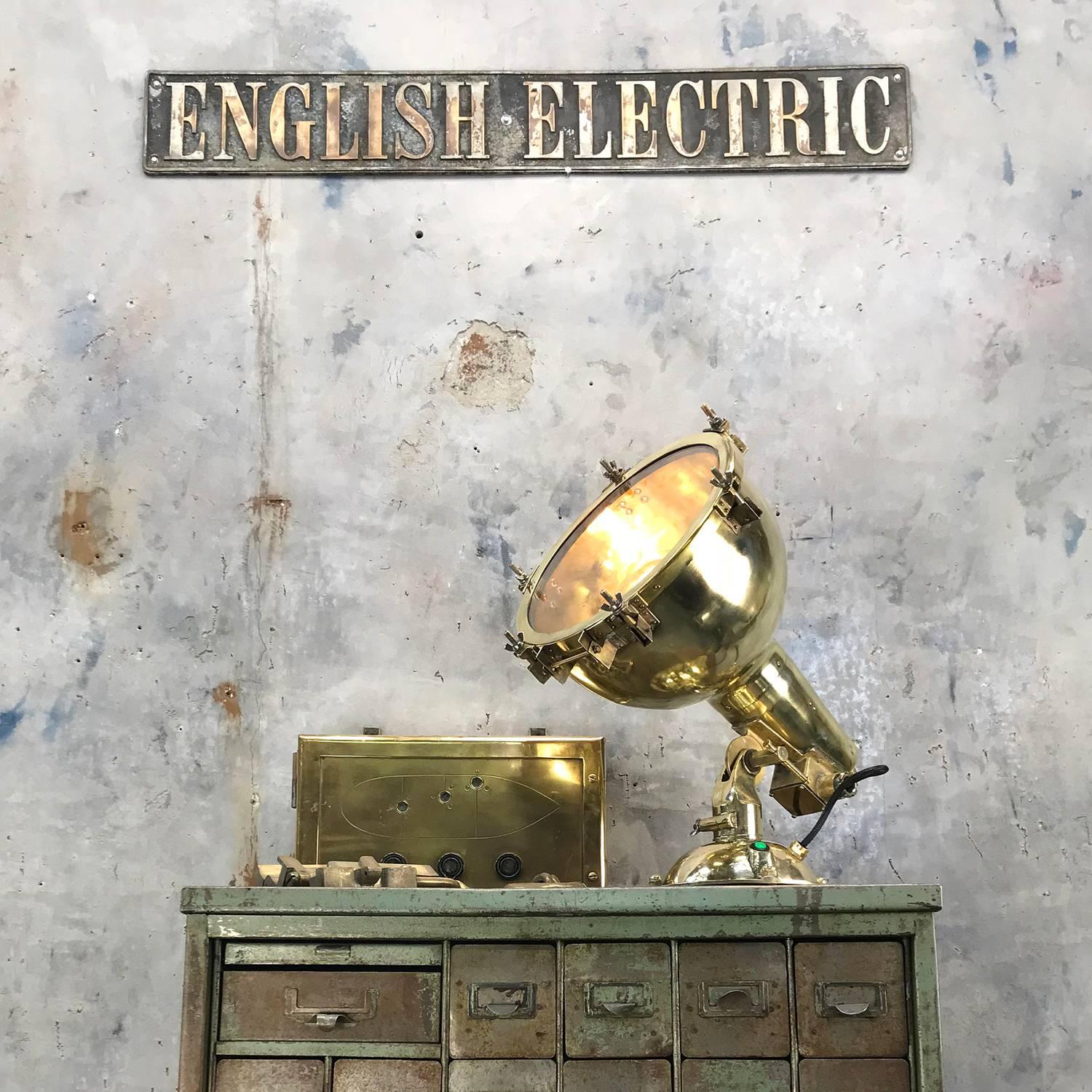 Japanese brass searchlight converted to desk lamp.

A complete brass fixture with all methods of fabrication, cast brass base, spun searchlight dome, and pressed fittings.

Reclaimed from Super tankers built in the 1960s and 1970s, these lights
