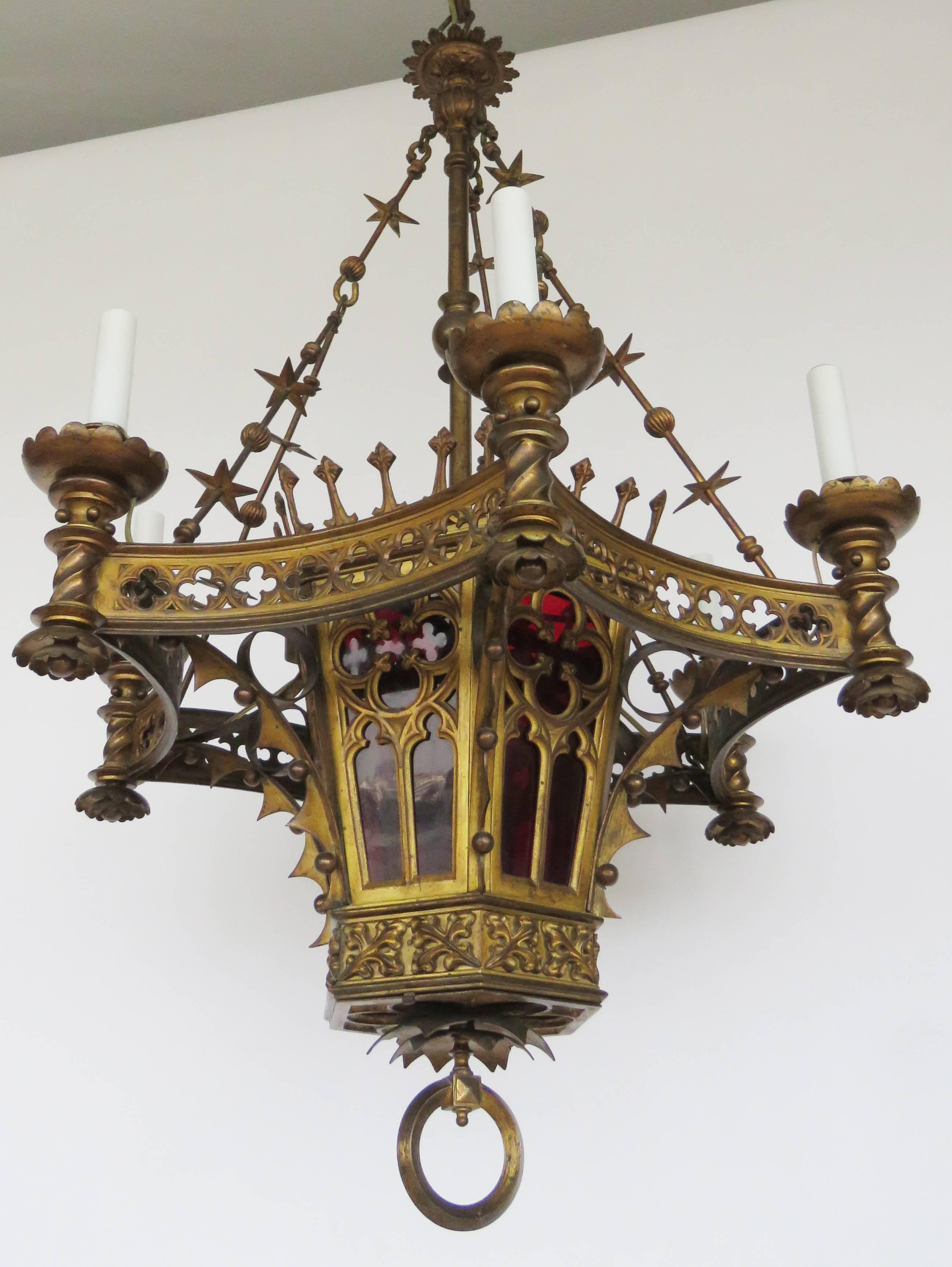 Rare Gothic style bronze originally gas chandelier with six outer candle arms and one central light. Newly UL wired.
