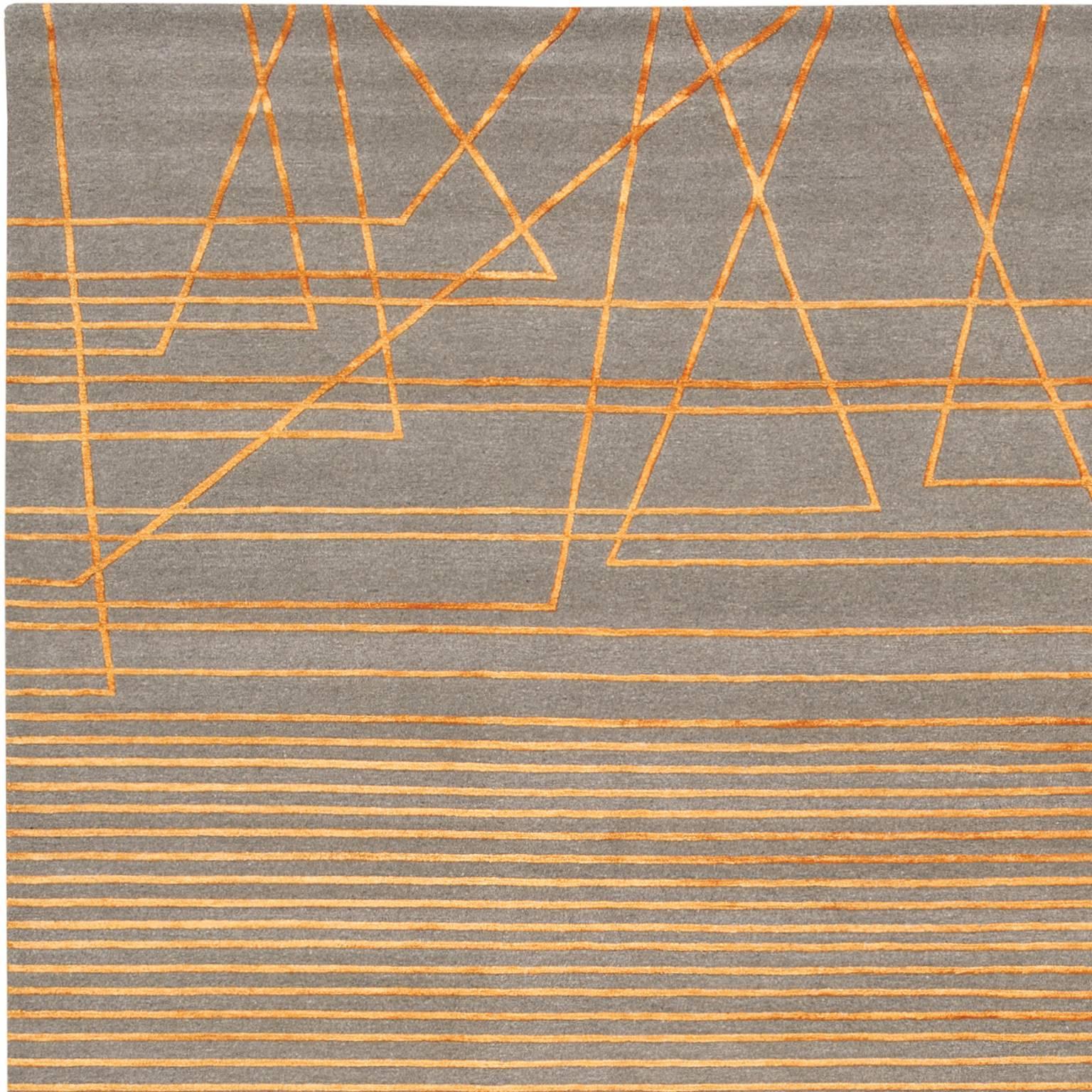 'Broken Lines' comes in three versions No. 01, No. 02 and No. 03. 'Broken Lines No. 02' is produced in four electric colorways with vibrant dyed silk combined with a natural undyed wool grey background providing a soft canvas for these vibrant rugs.