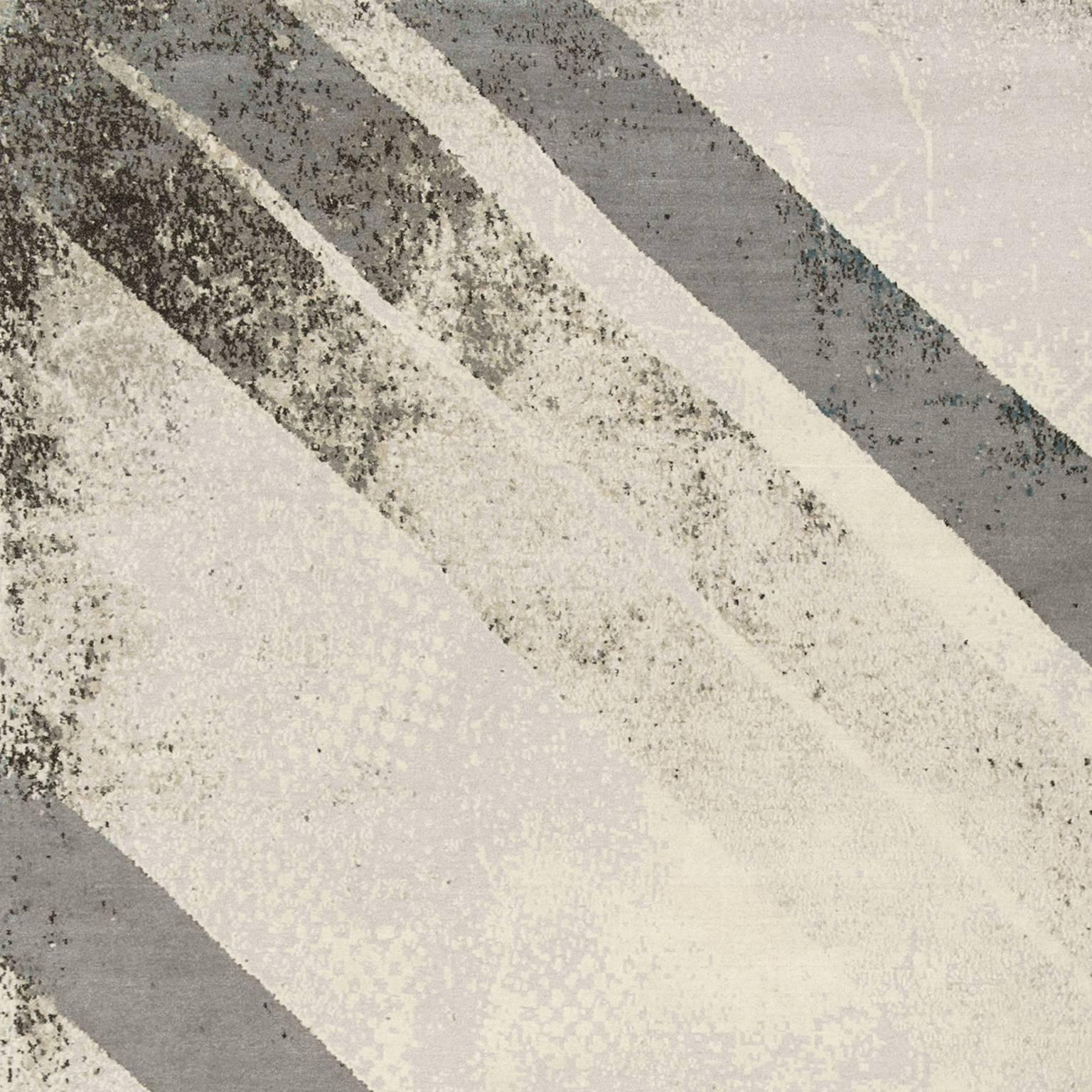 A geometric yet abstract design that uses the iconic chevron pattern. With it's eroded lines and border 'Chevron' is a modern rug that combines both concepts, geometric and abstract. Bespoke sizes and colour-ways to order.