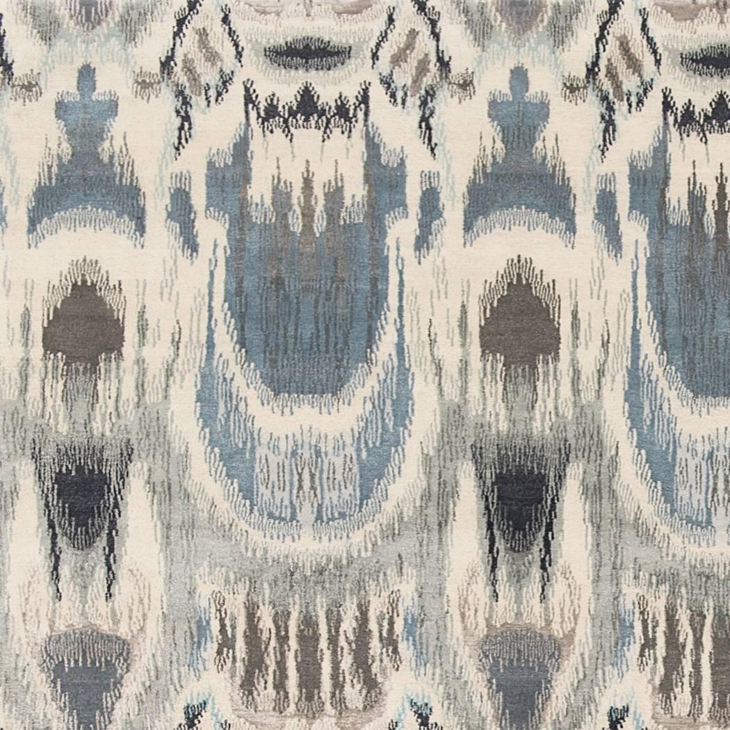 Ekat Fashion is produced in two colorways and is available in 100% wool and a wool and silk version. This multi-color Ikat rug has a lovely movement that resembles the unpredictable and unique designs of the original Ikat fabrics. Bespoke sizes and