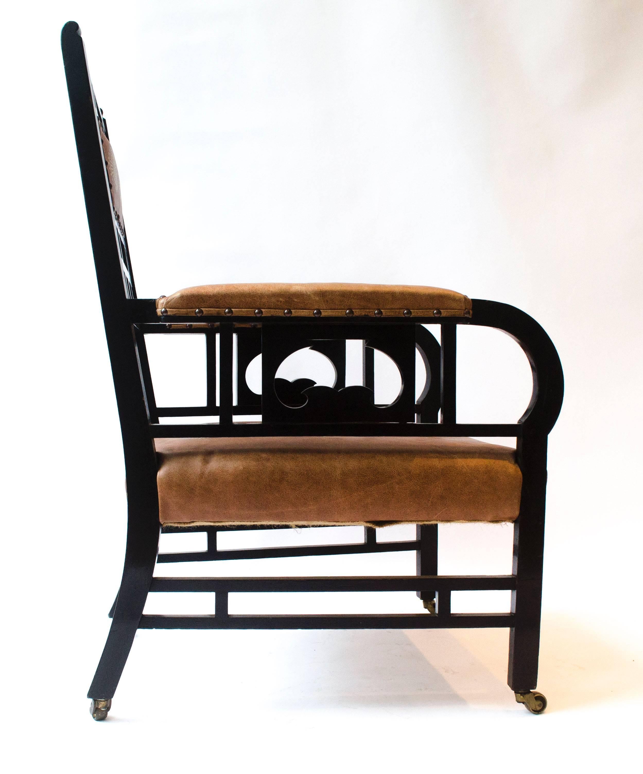 E.W. Godwin. (Attributed) an Anglo-Japanese armchair. Probably made by William Watt, the casters stamped 'Copes Patent'.
This armchair has the identical side stretchers as the front stretchers of his side chair made by W.Watt. (Illustration No