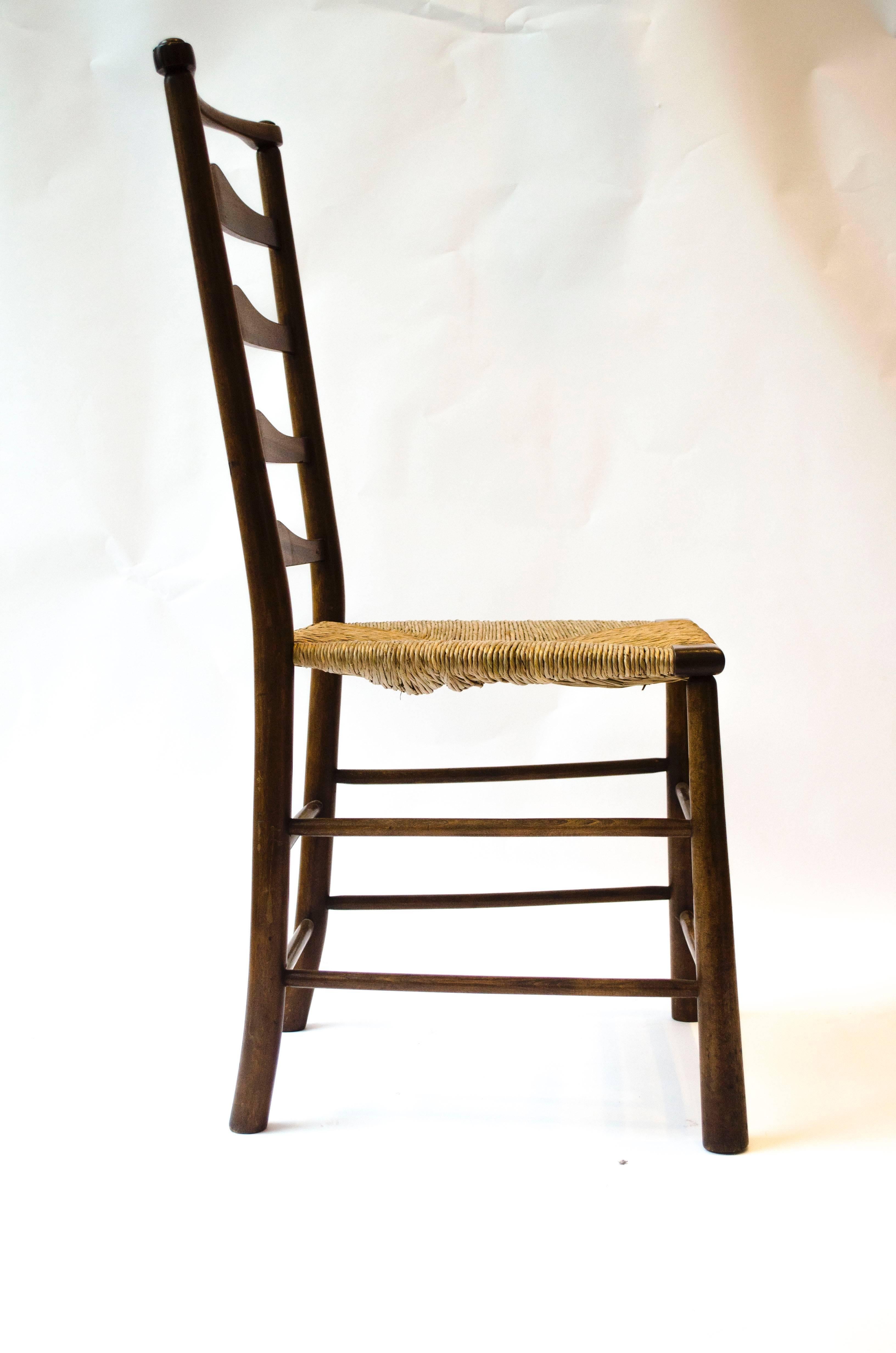 Arts and Crafts C R Ashbee Made By The Guild of Handicraft A Ladder Back Armchair and Side Chair