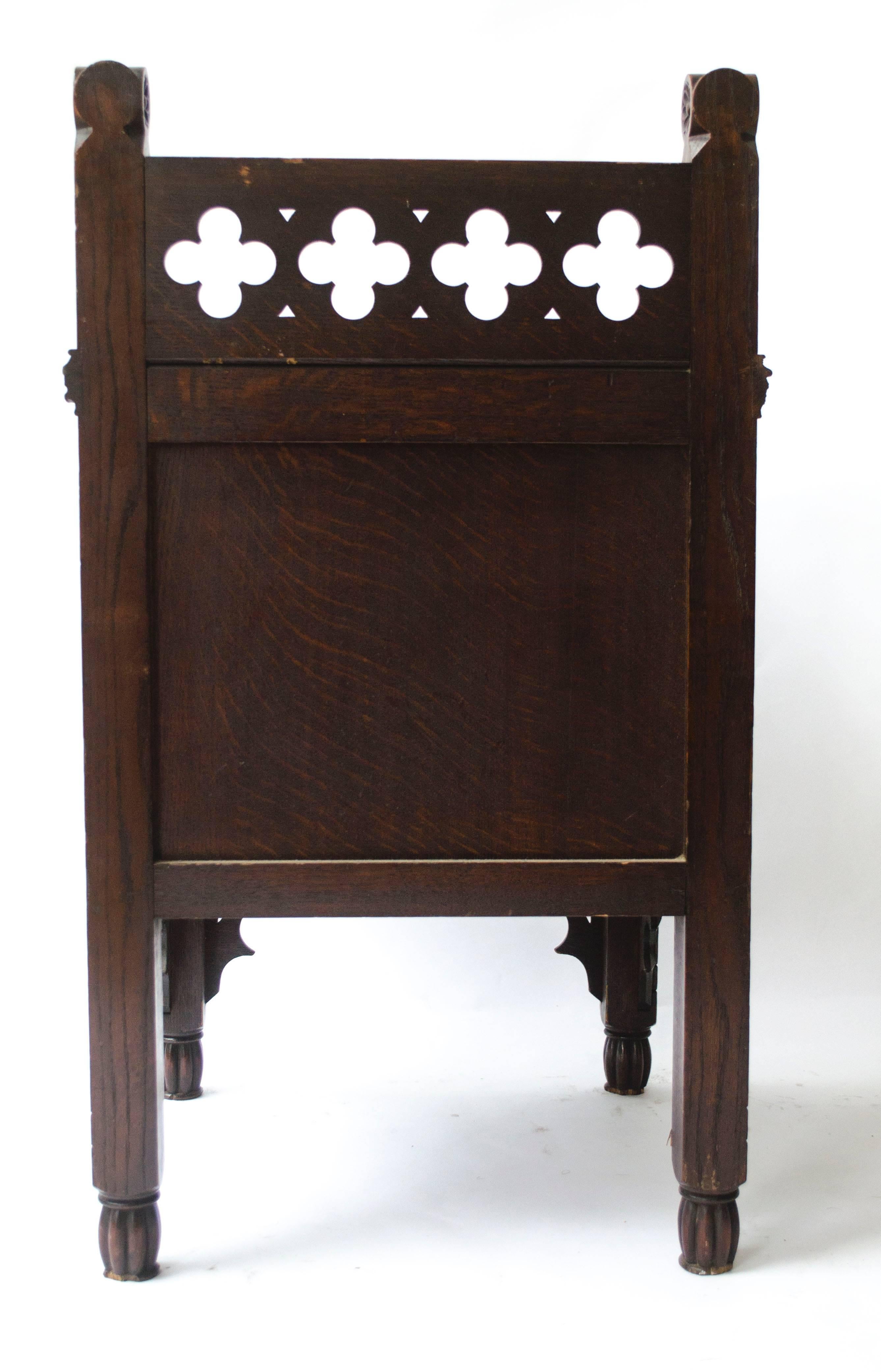 19th Century Bruce Talbert Gothic Revival Oak Night Table With Carved Linen Fold Carvings.