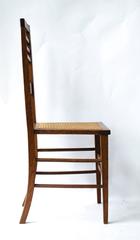 Shapland & Petter An Arts & Crafts Inlaid Oak Side Chair with a Pierced Heart