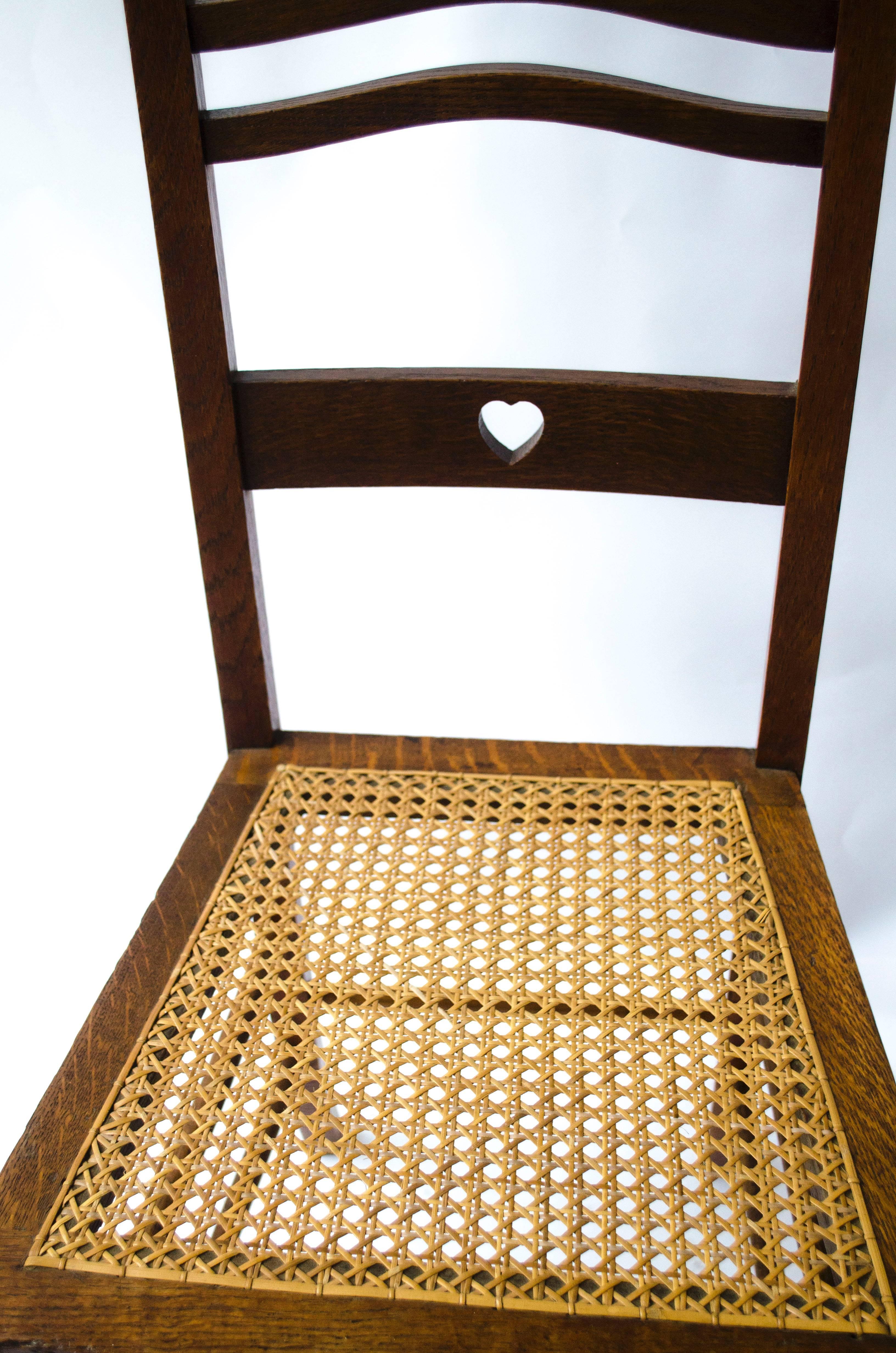 Shapland & Petter An Arts & Crafts Inlaid Oak Side Chair with a Pierced Heart In Good Condition For Sale In London, GB
