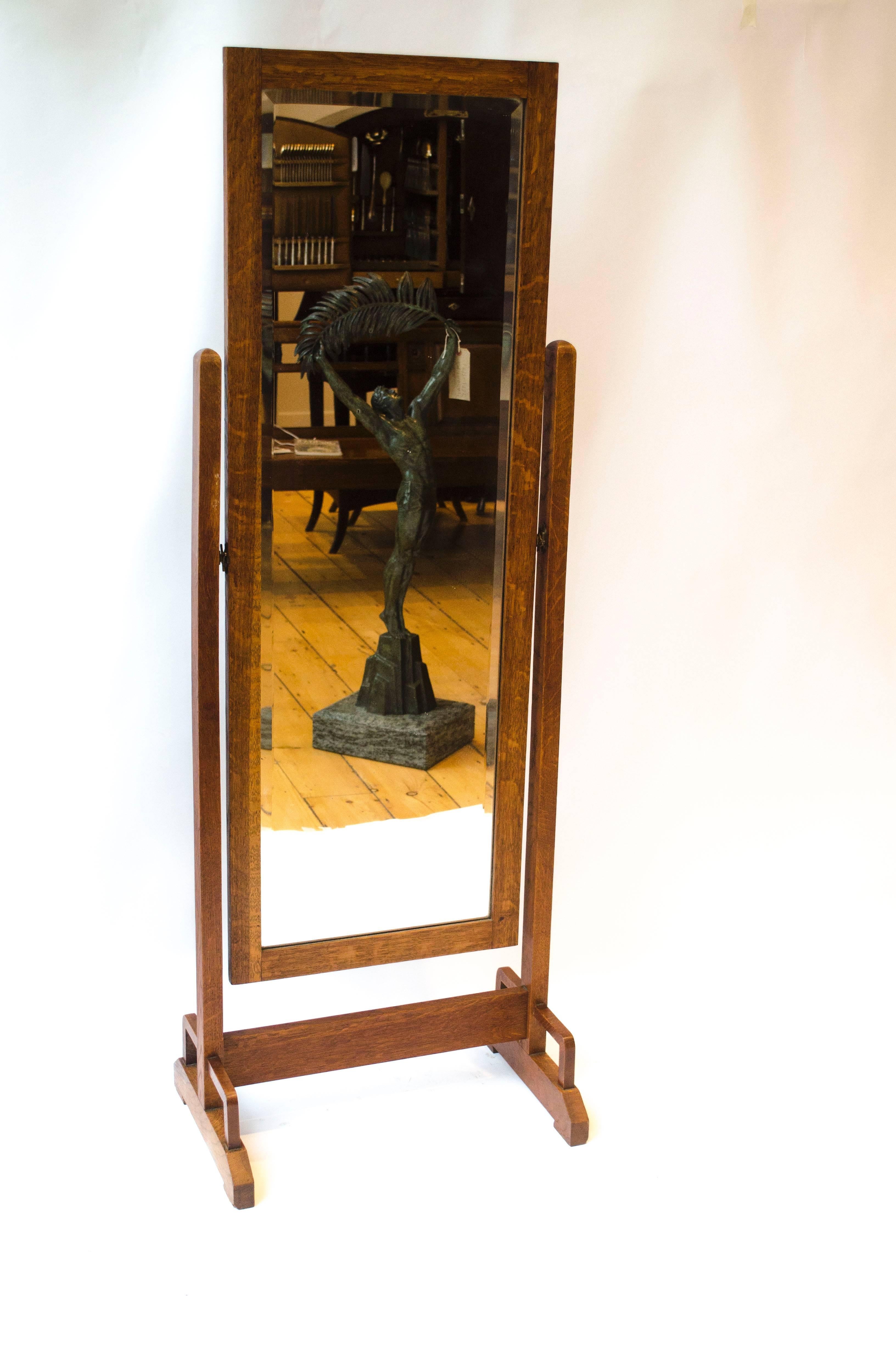 Edward William Godwin (1833-1886), attr., an Anglo-Japanese oak cheval mirror. 

  