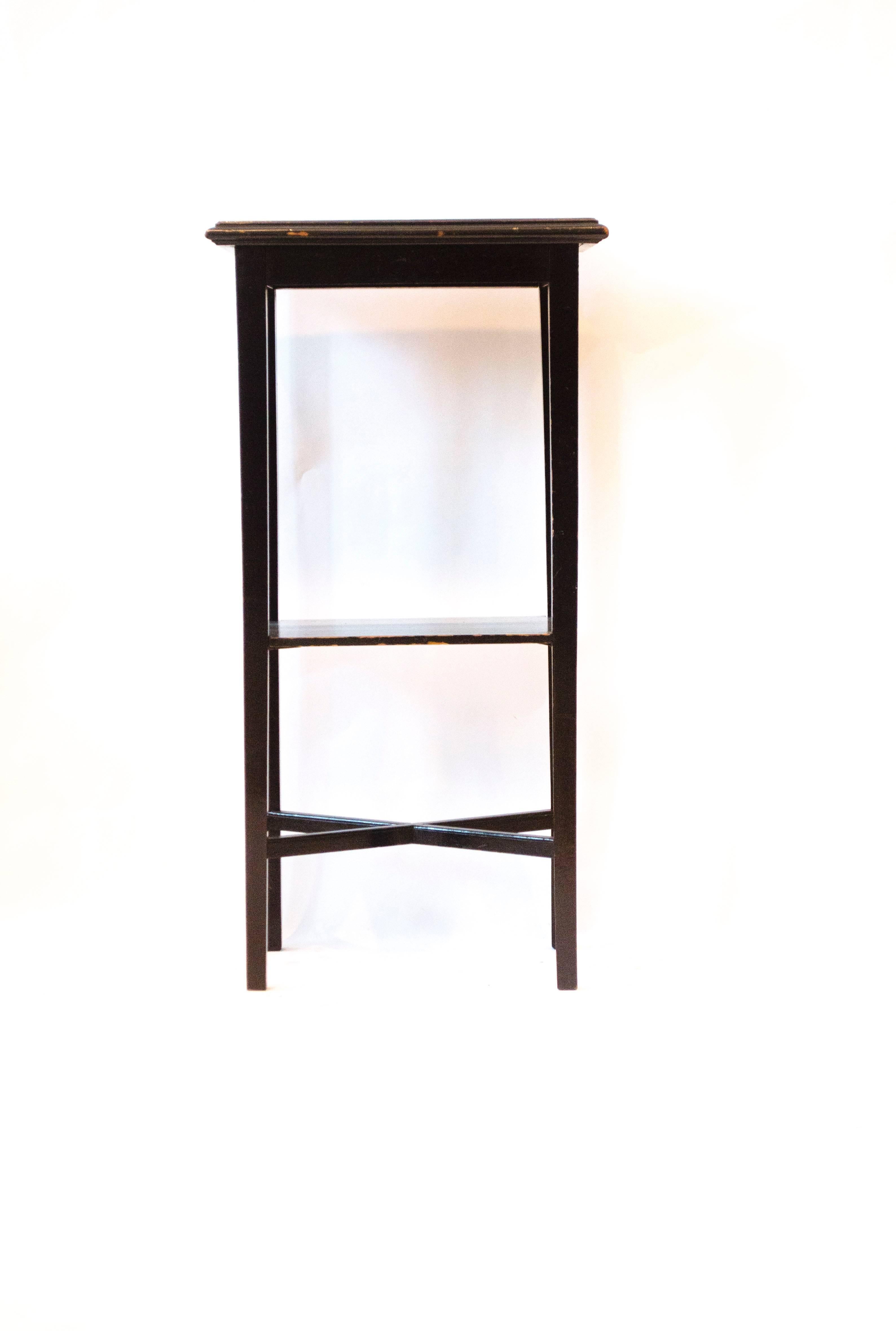 Aesthetic movement style floral tile-top ebonised side table. The tile has a fine crack running through it.
