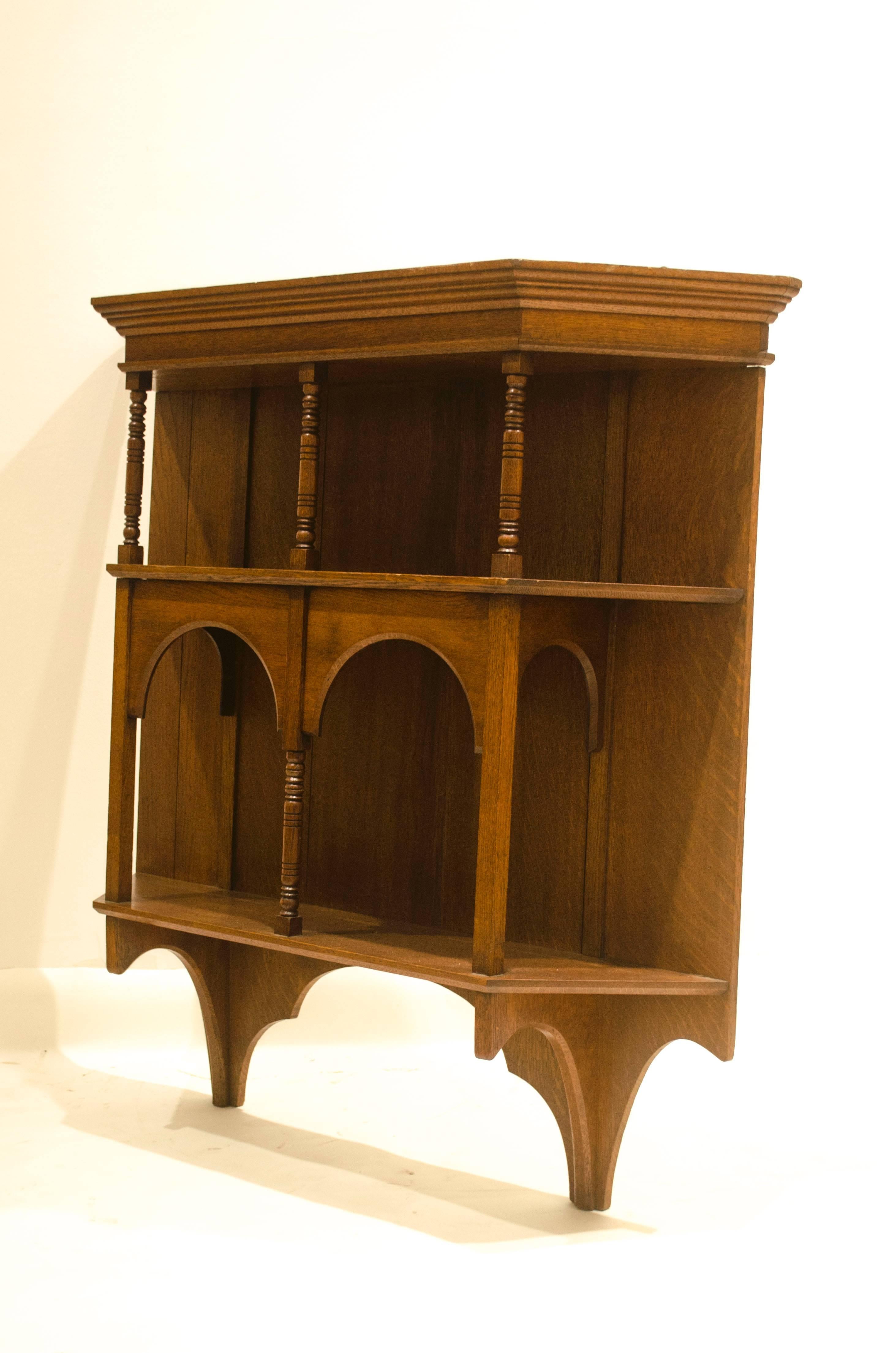 Edward William Godwin (attributed) for Collinson and Lock, a Fine set of hanging oak wall shelves, with turned supports. 
See Soros, Susan Weber 'The Secular Furniture of E.W. Godwin', This wall shelf has almost the identical turnings to a drawing