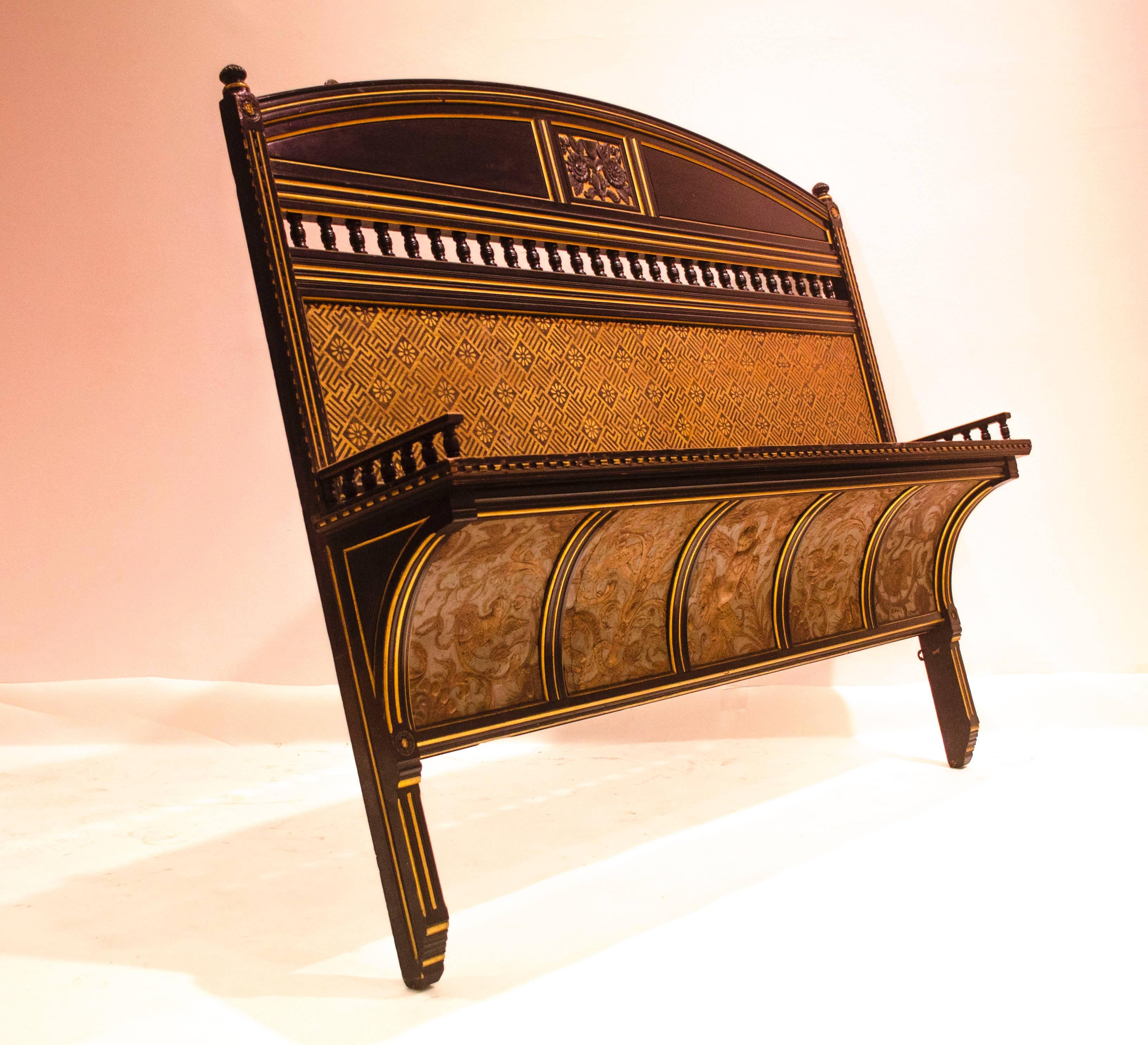 Bruce J Talbert, probably made by Gillows.
A rare Aesthetic Movement carved and gilt wall shelf with carved florets to the top center with gilt decoration above the shelf which has turned galleries to each side, to the base there is a curved