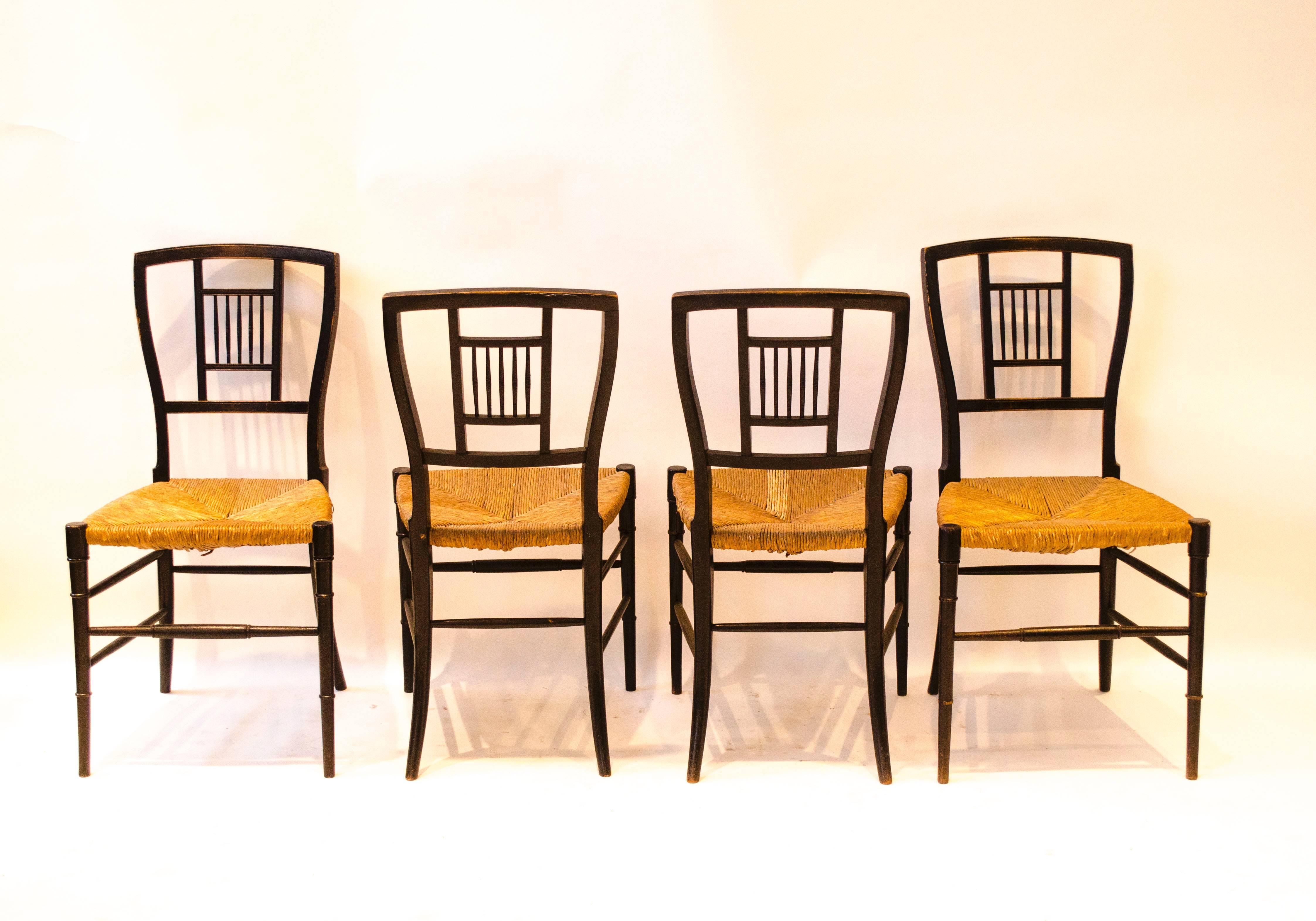 E W Godwin. A Set of Four Anglo-Japanese Ebonised Rush Seat Chairs In Good Condition In London, GB