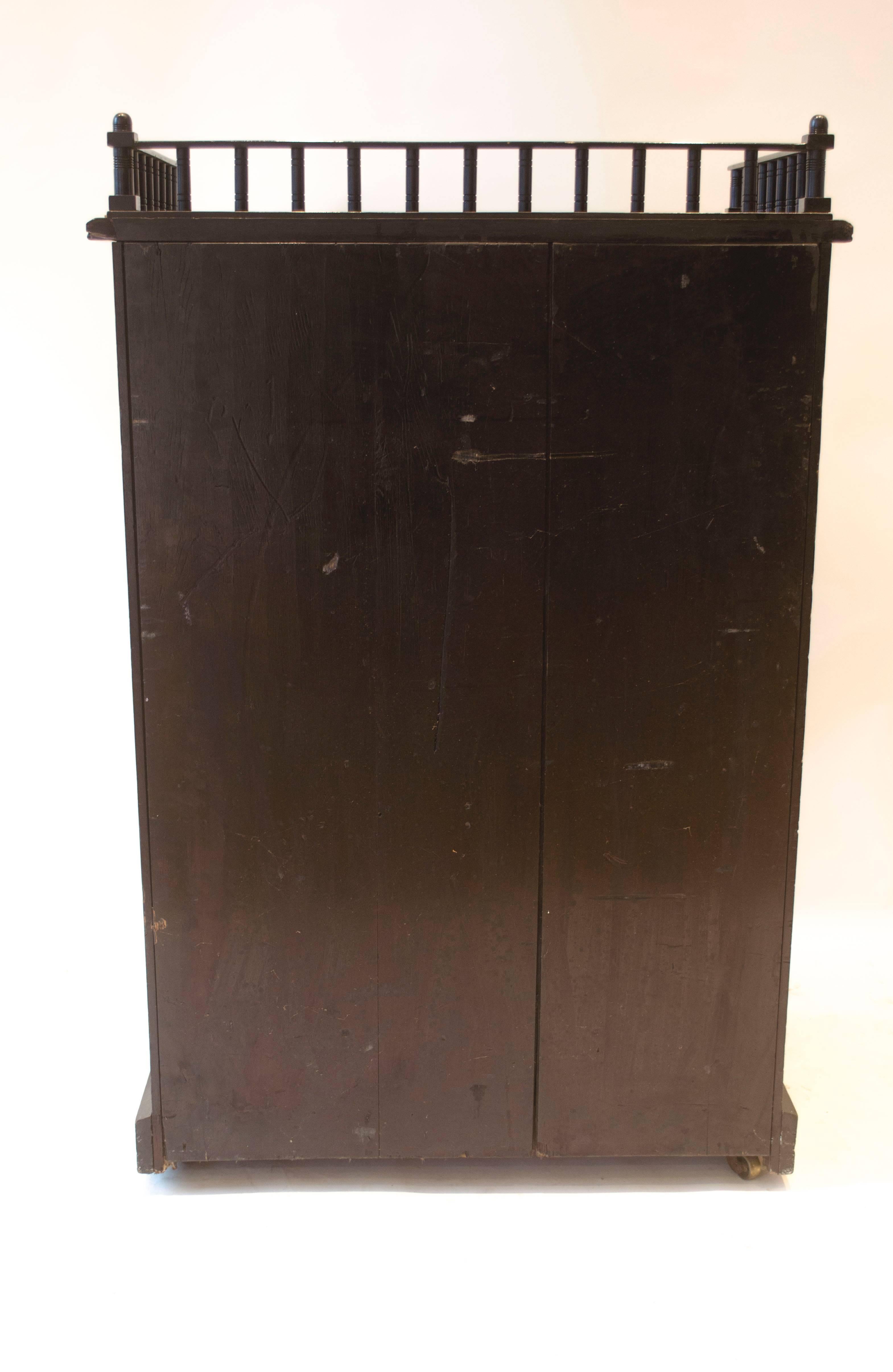 Dr Christopher Dresser attributed, An Aesthetic Movement Ebonised Music Cabinet 10