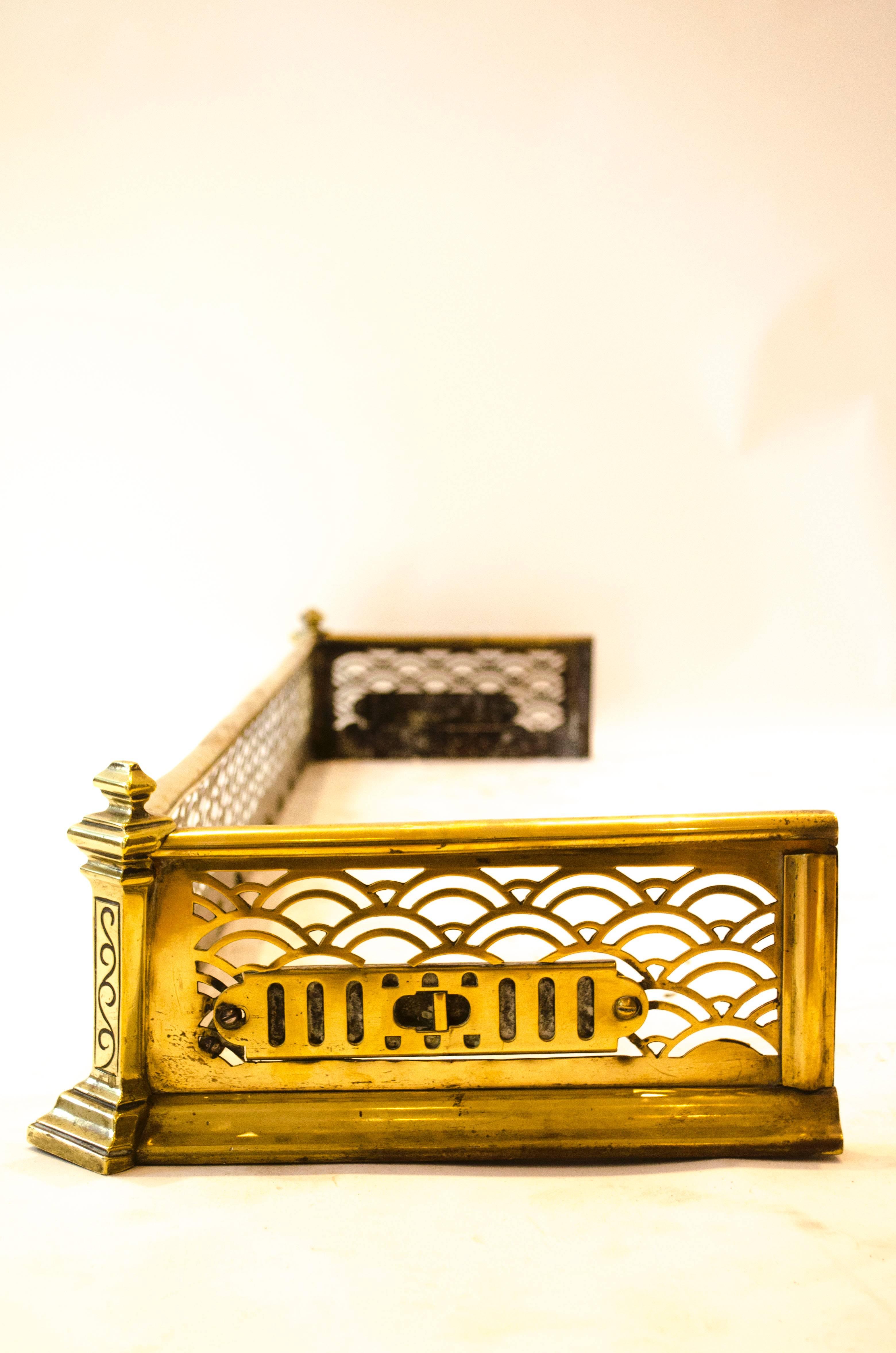 Thomas Jeckyll, made by Barnard Bishop and Barnard. A rare Anglo-Japanese
brass fender with pierced Japanese style decoration and adjustable air vents to the sides. This fender relates to the Sunray fireplace fender also by Jeckyll.
Jeckyll designed