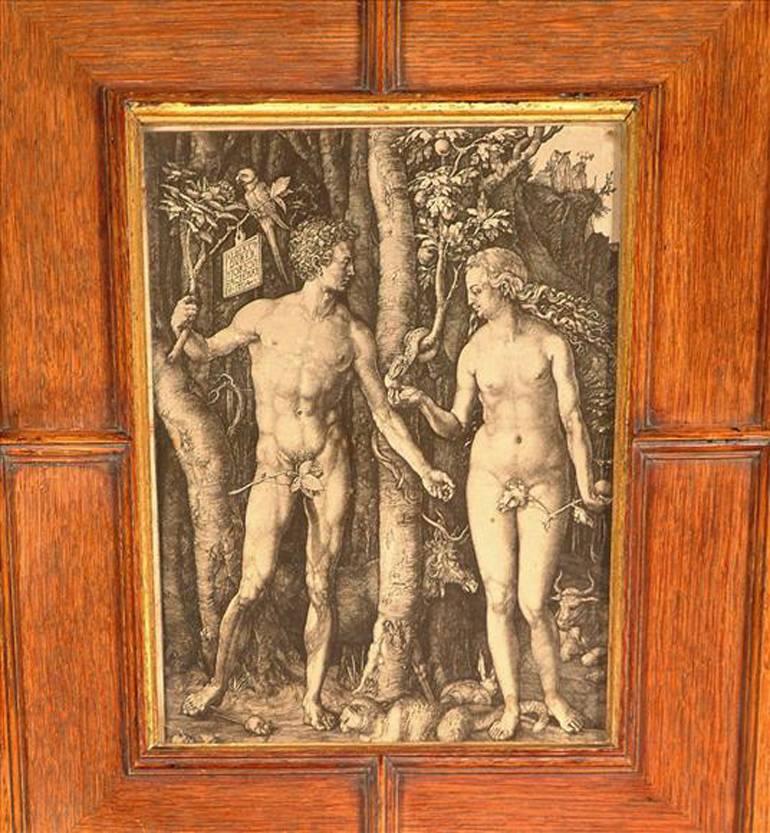 Bruce Talbert (attributed), an oak wall hanging bookcase, the door inset with a print of Adam and Eve after Albrecht Durer.
 