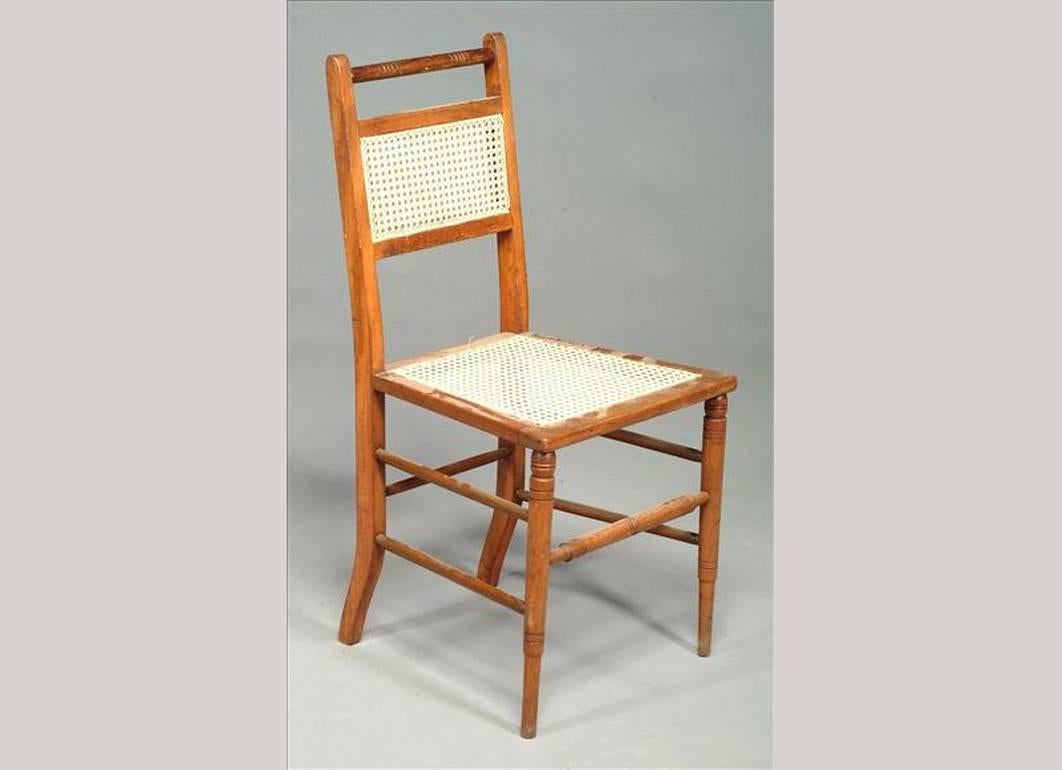 Edward William Godwin (attributed), a set of four Anglo-Japanese cane seat chairs, with incised turned details and Greek style front legs. 
See Soros, Susan Weber, 'The Secular Furniture of E.W. Godwin,' p. 88, illus 107 and p.96 illus 115 for