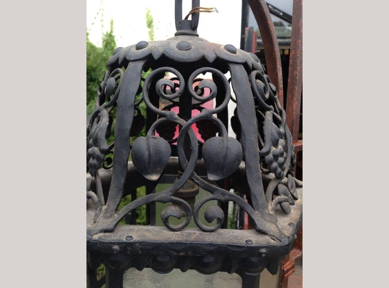 English An Arts and Crafts Hand Forged Blacksmith made Iron Lantern with Stylised Petals For Sale