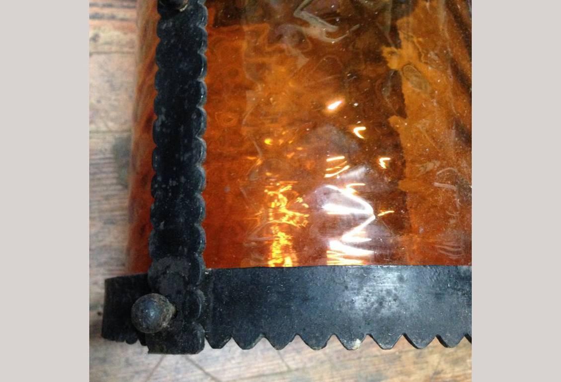 19th Century A Large Arts and Crafts Iron Lantern Retaining the Original Dappled Amber Shade. For Sale