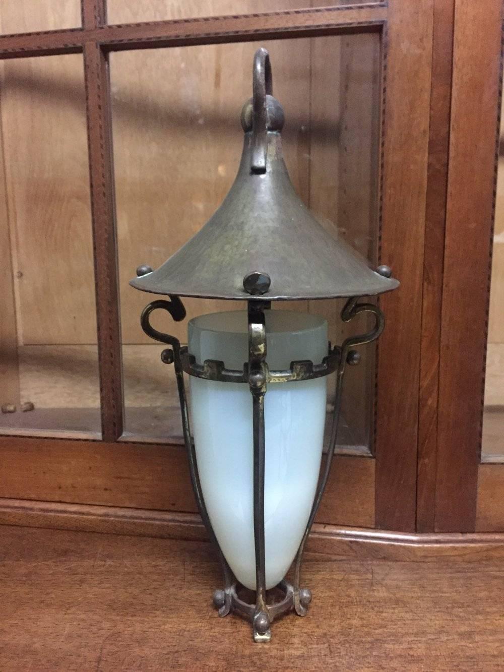 Birmingham Guild of Handicraft, attributed. A wonderful well designed Arts and Crafts copper and brass conical lantern with a subtle castellated detail below the hat, retaining the original Vaseline/Uranium Glass Shade, with a hand crafted lock and