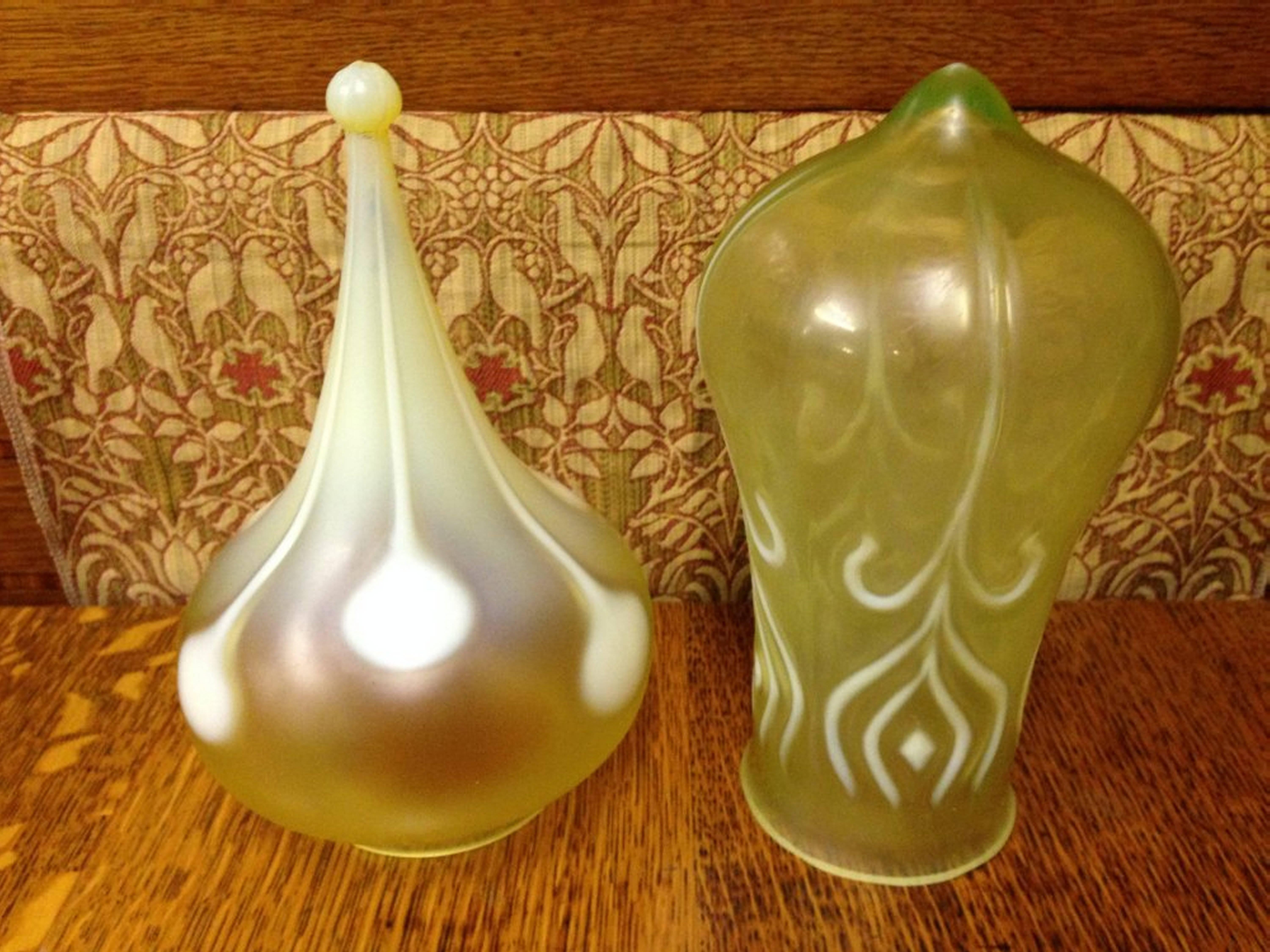 A spot teardrop shade (left) and a peacock feather Arts and Crafts Vaseline/Uranium Glass Shades  (right).
Measures: Left height 8