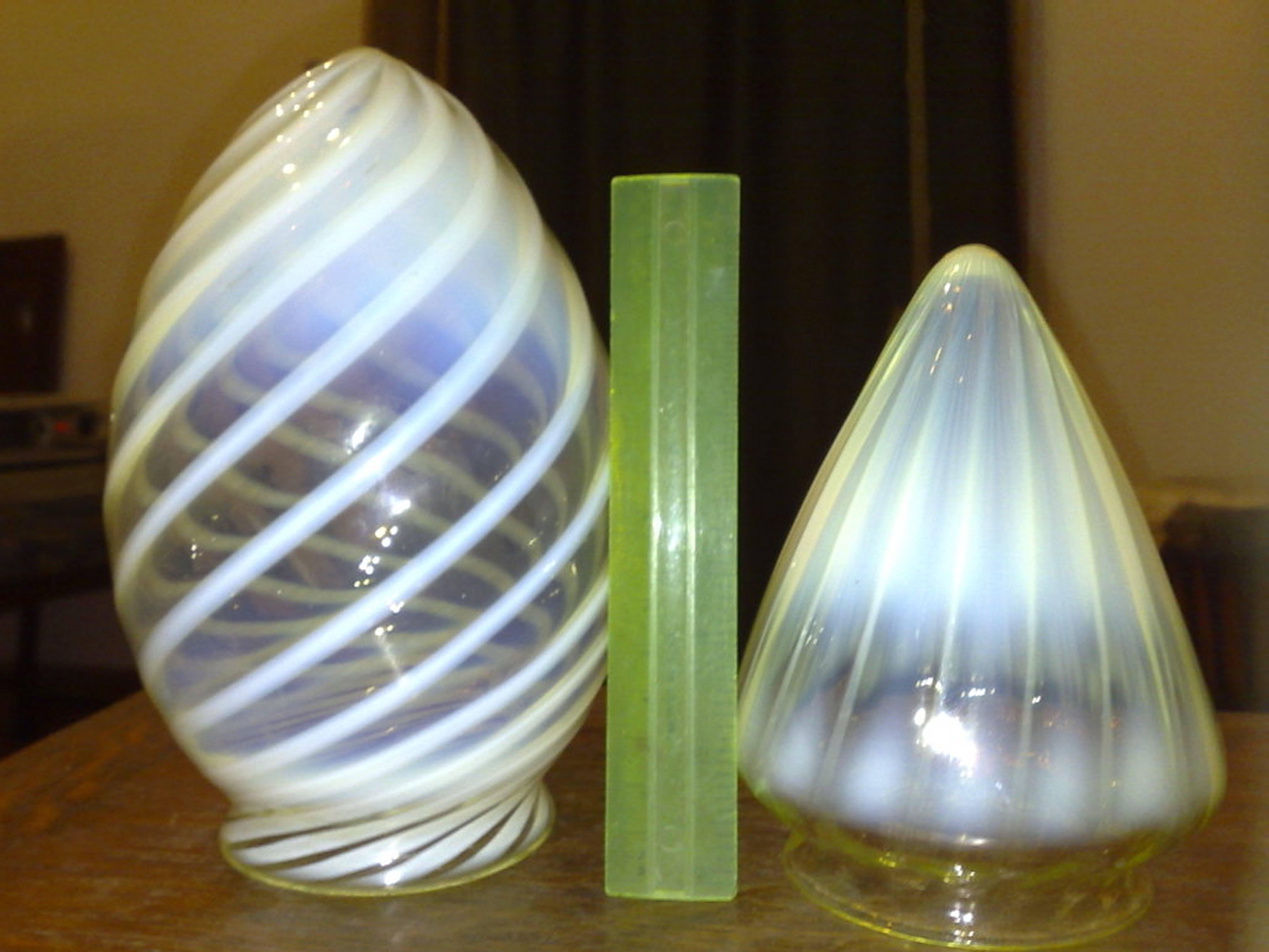 Left: A vaseline teardrop swirl shade. Measures: Width 5
