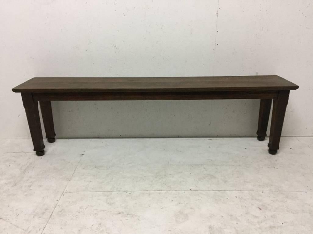 C F A Voysey, attributed. Possibly designed for the offices for the Essex and Suffolk Equitable Insurance Society. A superb quality Arts and Crafts long and narrow hall or library table made from quarter sawn oak. The tapering legs with turned balls