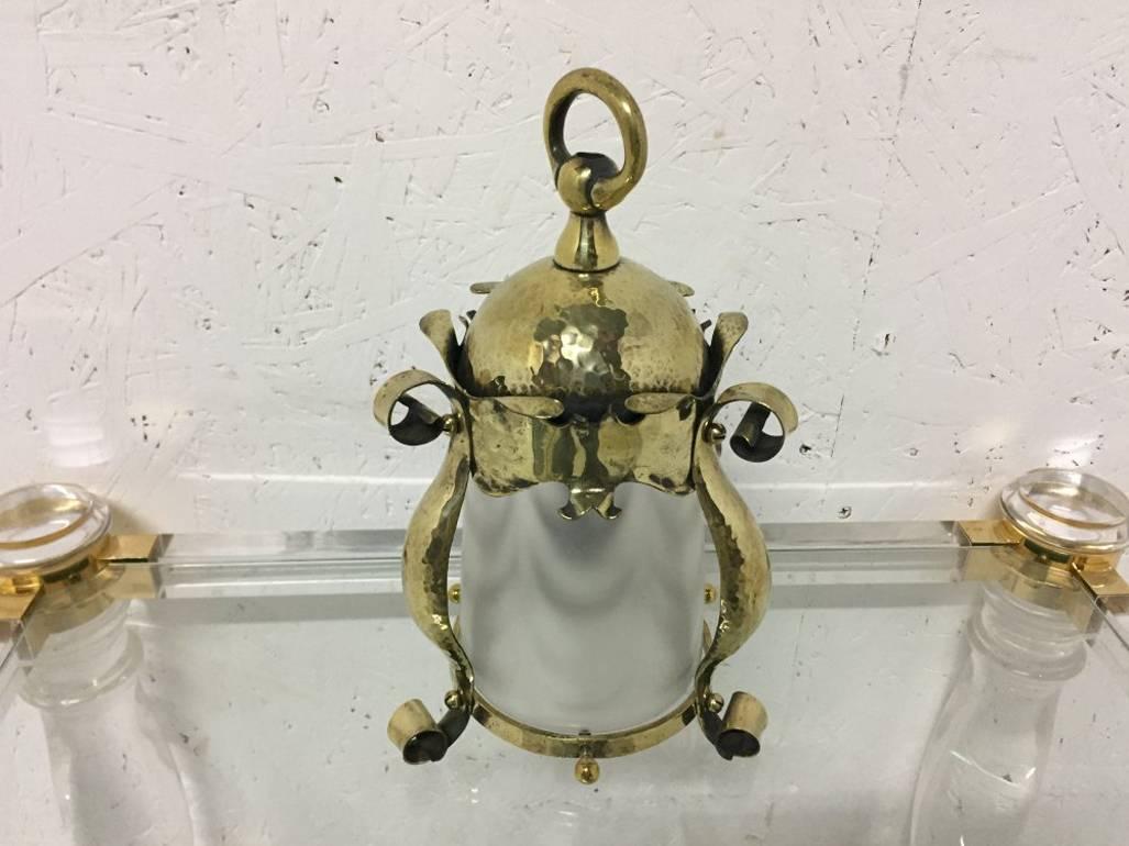 English An Arts and Crafts Hammered Brass Lantern with Opaque Ribbed Glass Liner For Sale