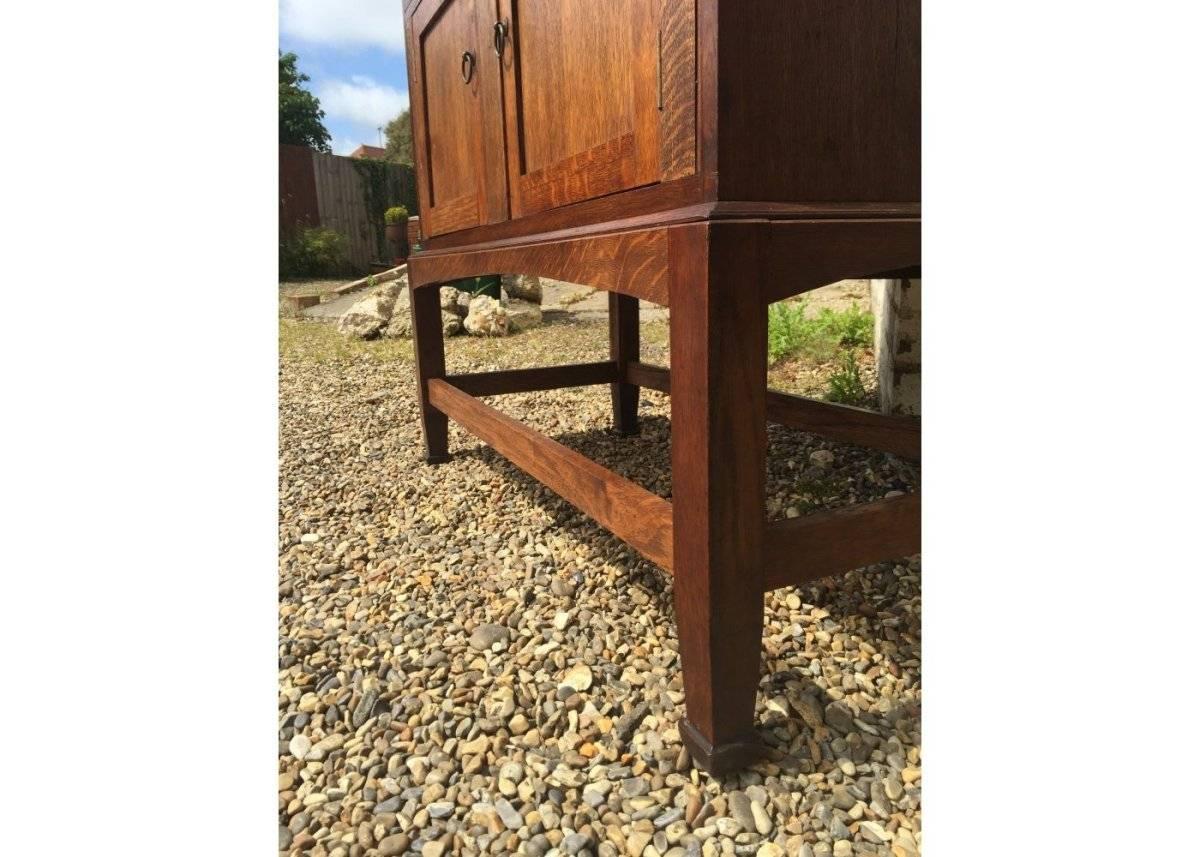 Arts and Crafts An Arts & Crafts Craftsman made simple Oak Dresser with Decorative Shaped Top  For Sale
