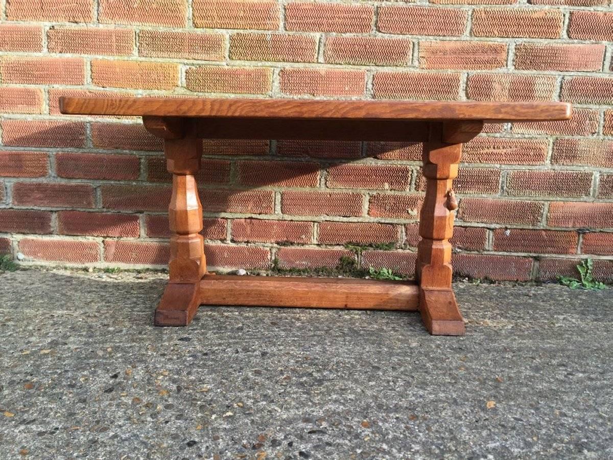 Mouseman. An Arts & Crafts oak coffee table with the signature mouse running up the leg.