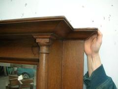 Arts & Crafts Oak Fire Surround by Shapland and Petter with five carved hearts.