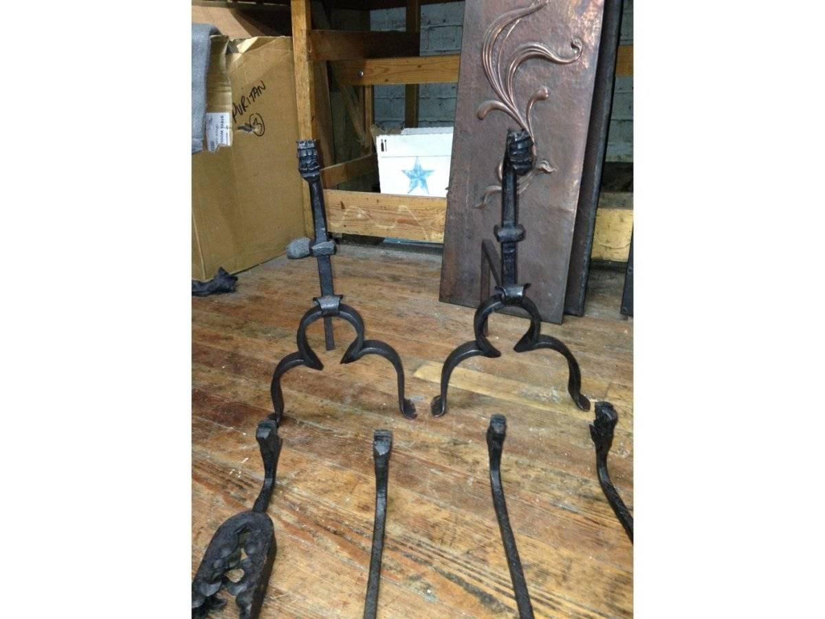 A good set of four Arts and Crafts hand-forged fire utensils with stylised dogs heads and zig-zag dot and line chased details, each piece is quite long and therefore naturally protects you from the heat of the fire.
With a pair of matching fire