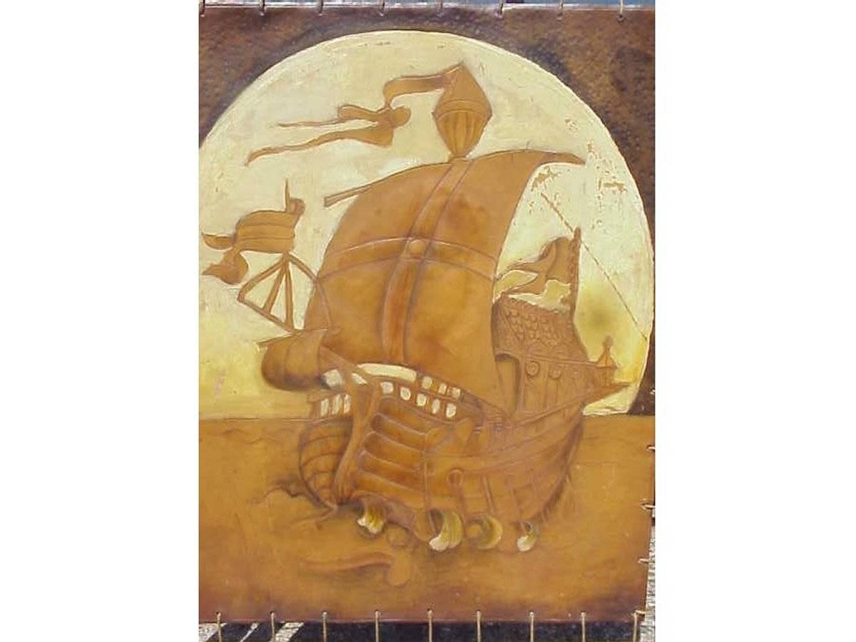 A carved and Adzed carved oak fire screen attributed to Robert Thompson Mouseman with embossed and painted leather panel of a ship in full sail. The owl's on this screen are almost identical to known ones carved in the Mouse man