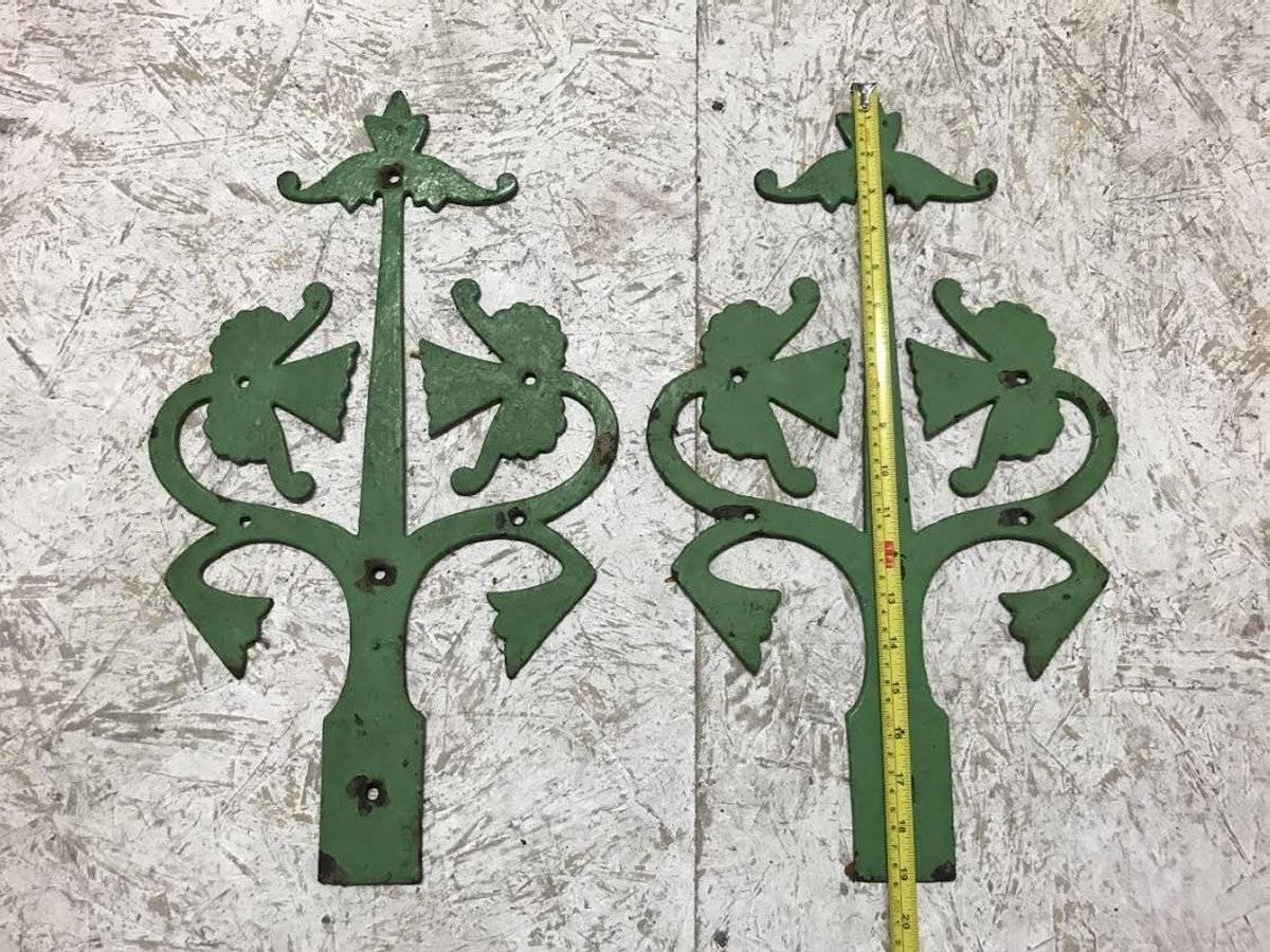A pair of Gothic Revival cast iron hinges, circa 1875
They are painted green one side.