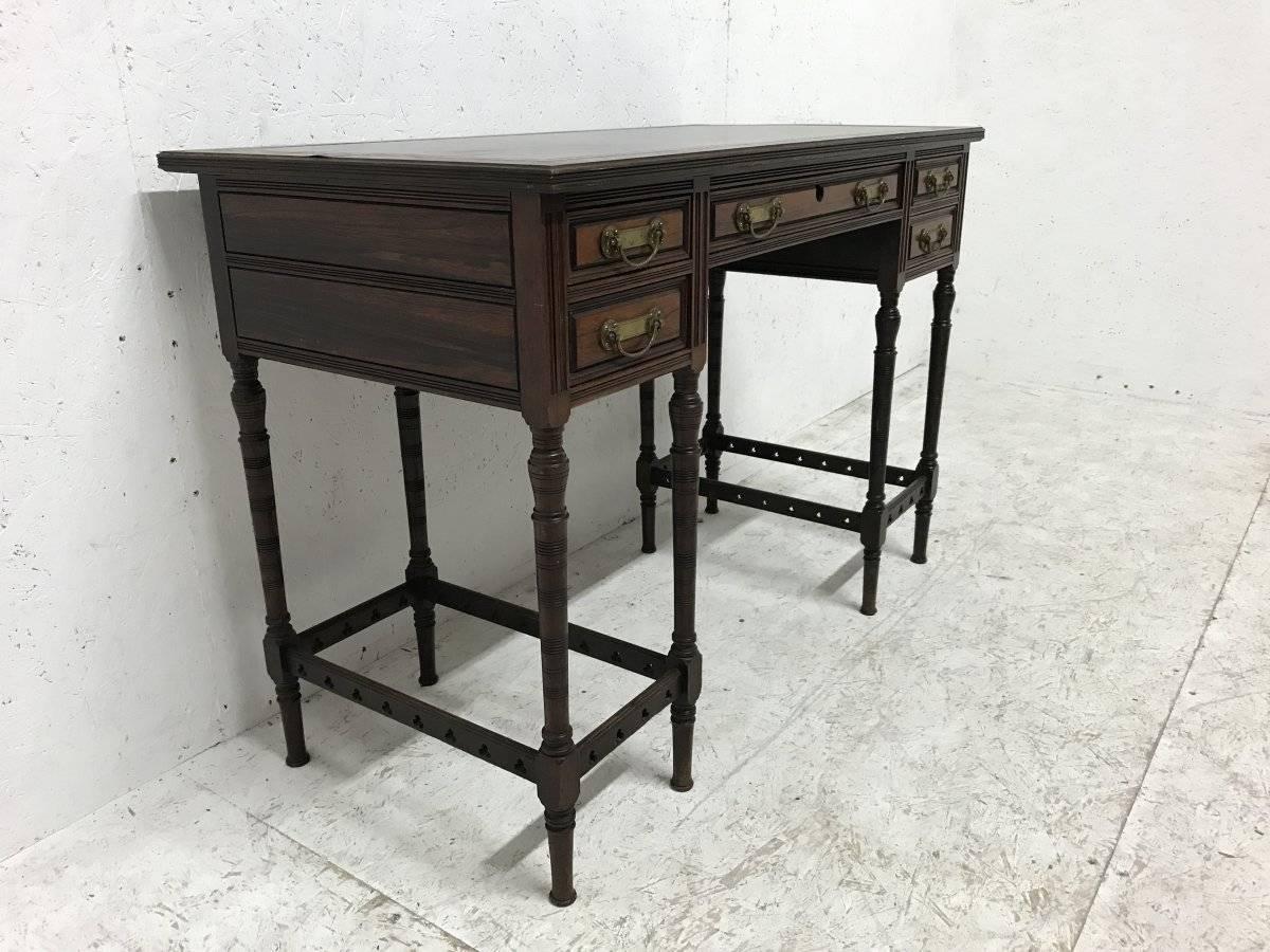 English Collinson & Lock, Attri to E W Godwin, A Fine Quality Rosewood Writing Table For Sale