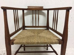E A Taylor, Wylie and Lochhead or Shapland & Petter. A Fine Rush Seated Armchair