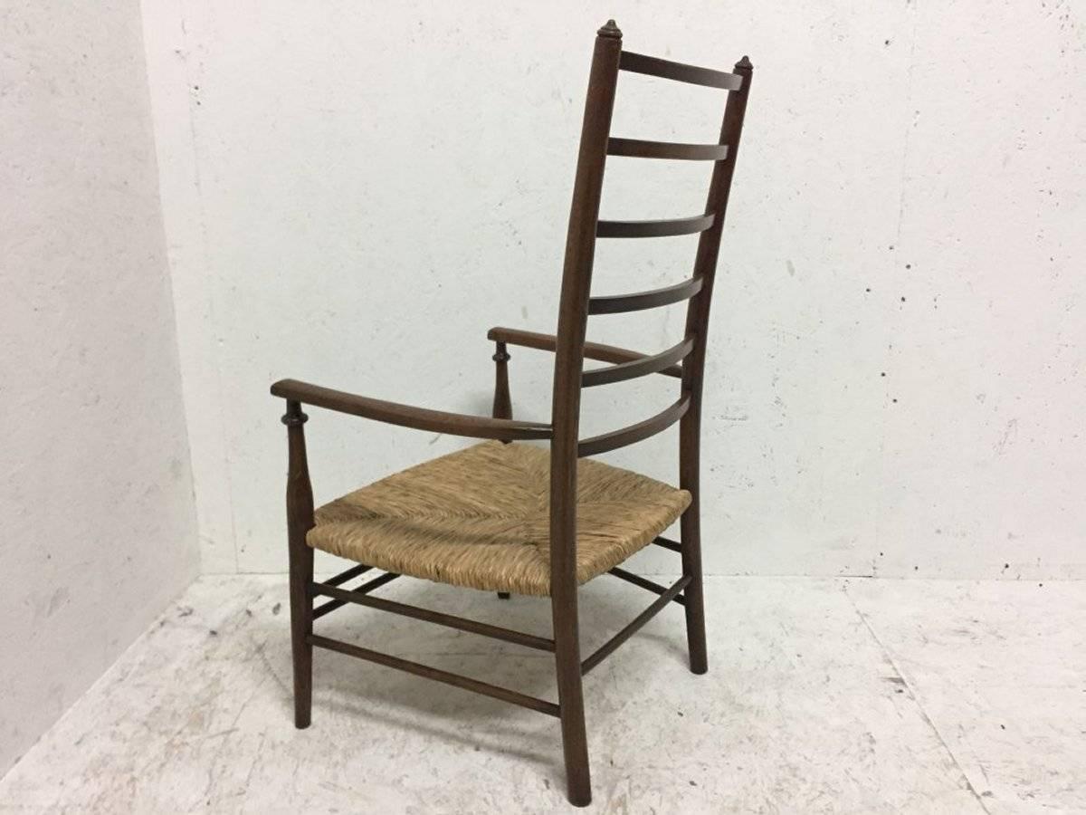 Arts and Crafts Liberty & Co Arts & Crafts Low Ladder Back Armchair with Rush Seat