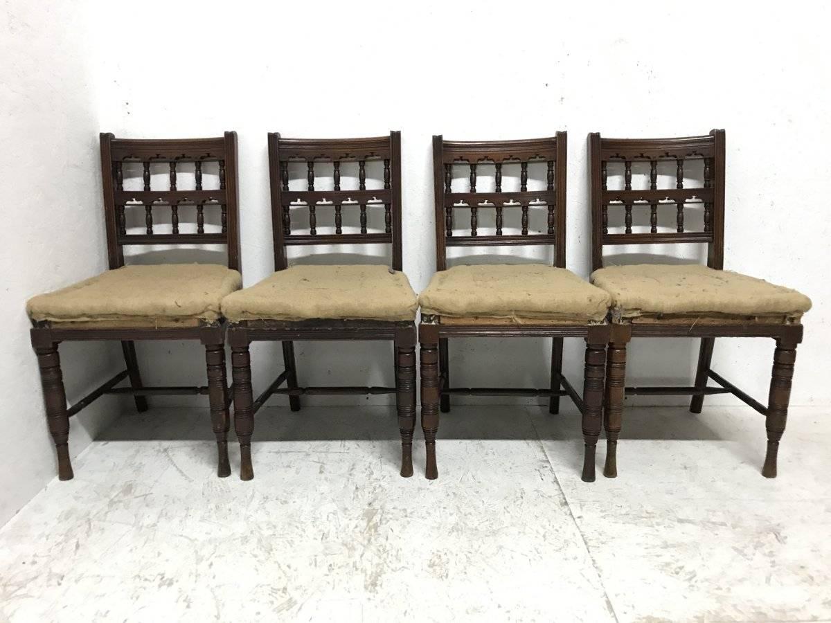 Bruce Talbert. A good quality Harlequin set of ten walnut dining chairs consisting of a matched set of six and a matched set of four. Made by Gillows of Lancaster with architectural turned details.
As you can see the traditional horse hair and