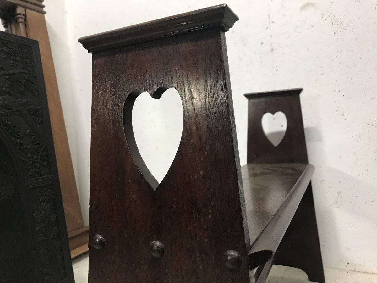 Hand-Crafted Liberty & Co. An Arts & Crafts Oak Window or Hall Seat with Large Pierced Hearts For Sale