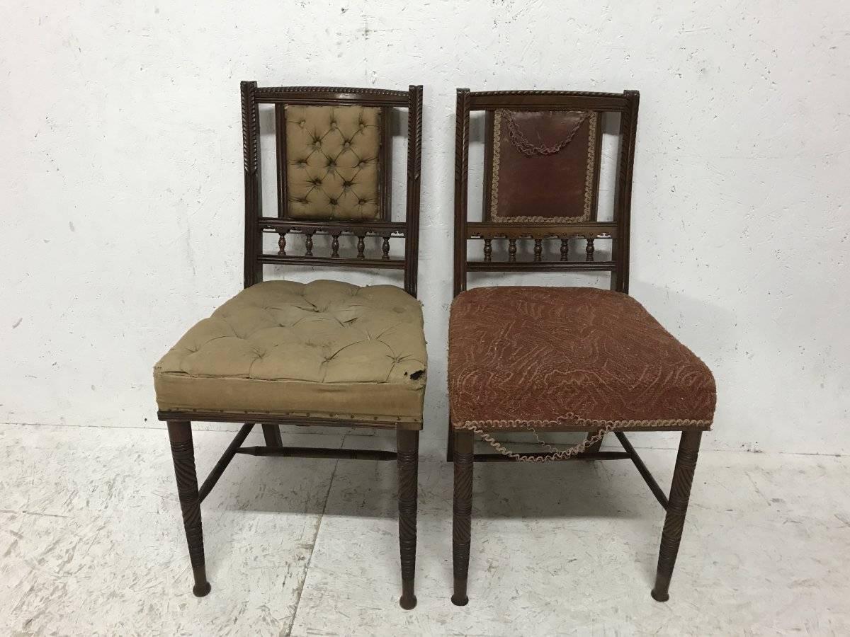 Bruce Talbert Gillows A harlequin set of eight Aesthetic Movement dining chairs. 
There are a matched set of six one shown on the left with button upholstery and an almost identical pair on the right with plain brown upholstery. This set can be