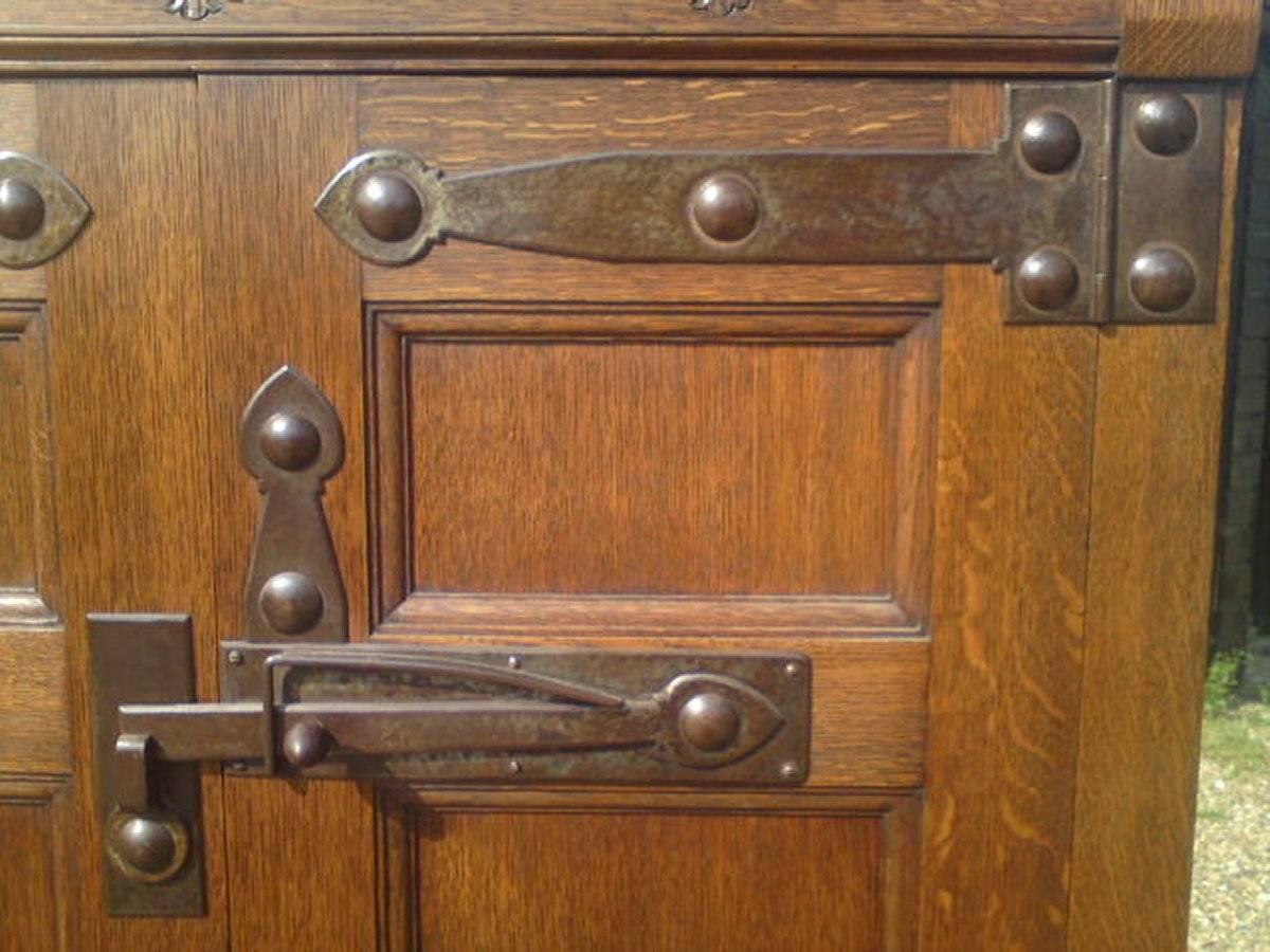 Hand-Carved Arts & Crafts Oak Linen Press by Liberty and Co with Fleur De Lys carved details