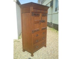 Arts & Crafts Oak Linen Press by Liberty and Co with Fleur De Lys carved details