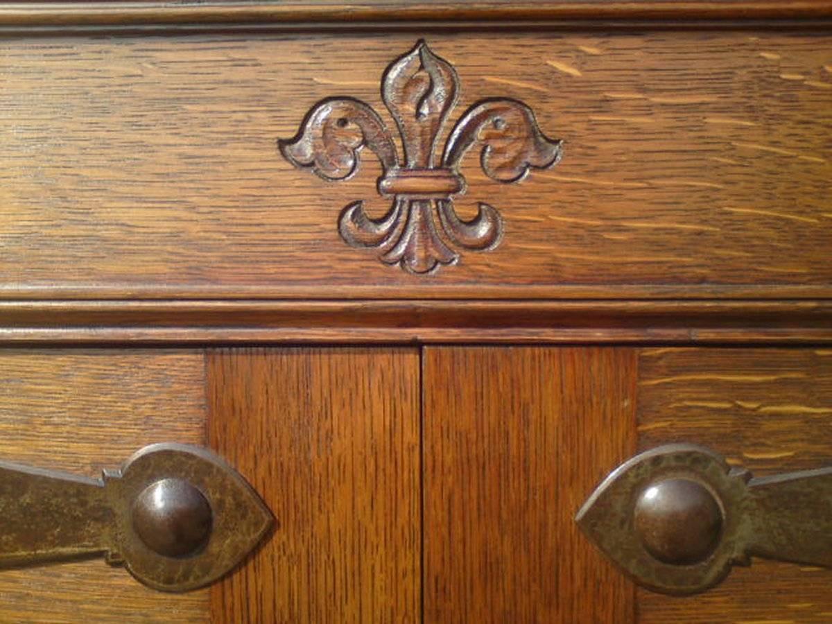 English Arts & Crafts Oak Linen Press by Liberty and Co with Fleur De Lys carved details