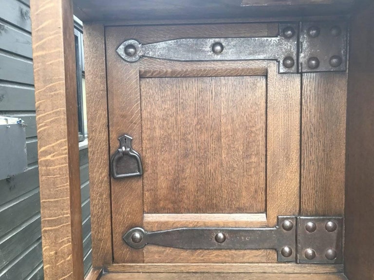 Hand-Carved Arts & Crafts Oak Treble Wardrobe with Five Drawers by Liberty & Co. For Sale