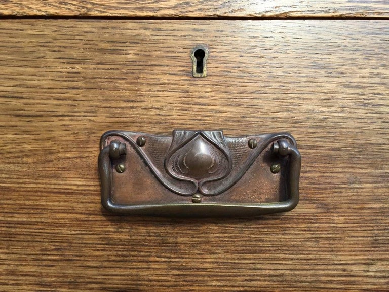 Arts and Crafts Oak Chest of Drawers with Copper Handles and a Pierced