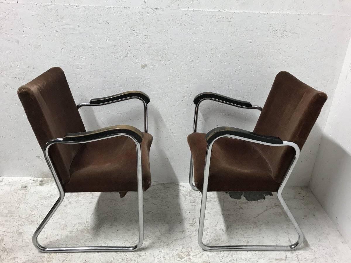 European Thonet, a Pair of 1930s Tubular Steel Armchairs with Ebonized Armrests For Sale