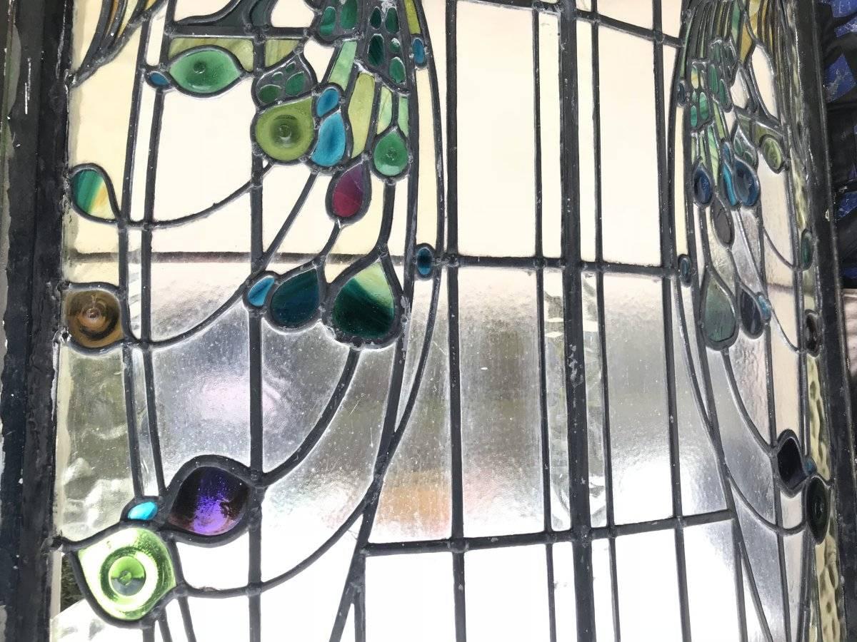 A Rare Arts and Crafts Stained Glass Bow Fronted Window with Colourful Peacocks 1
