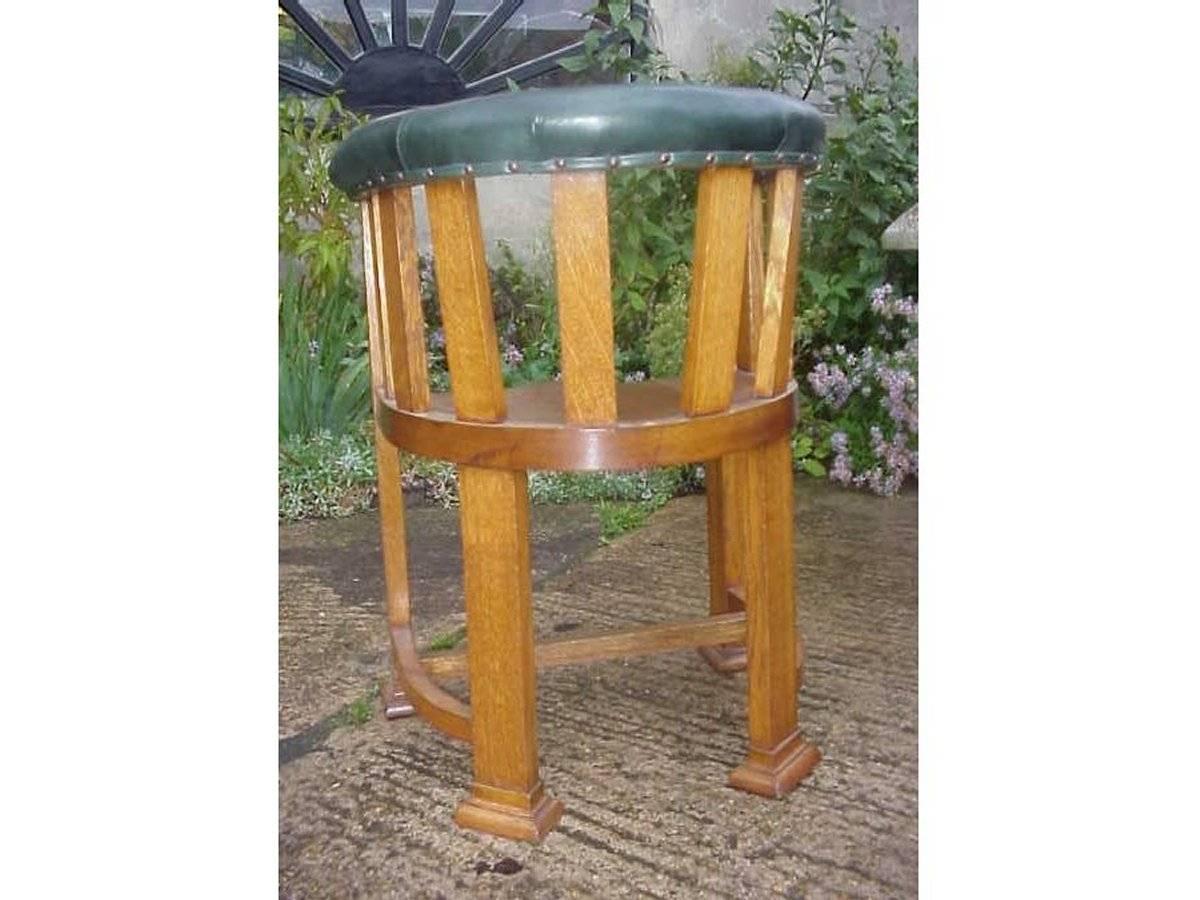 English Waring and Gillows, Ten Arts and Crafts Oak Tub Chairs with Shaped Solid Seats For Sale