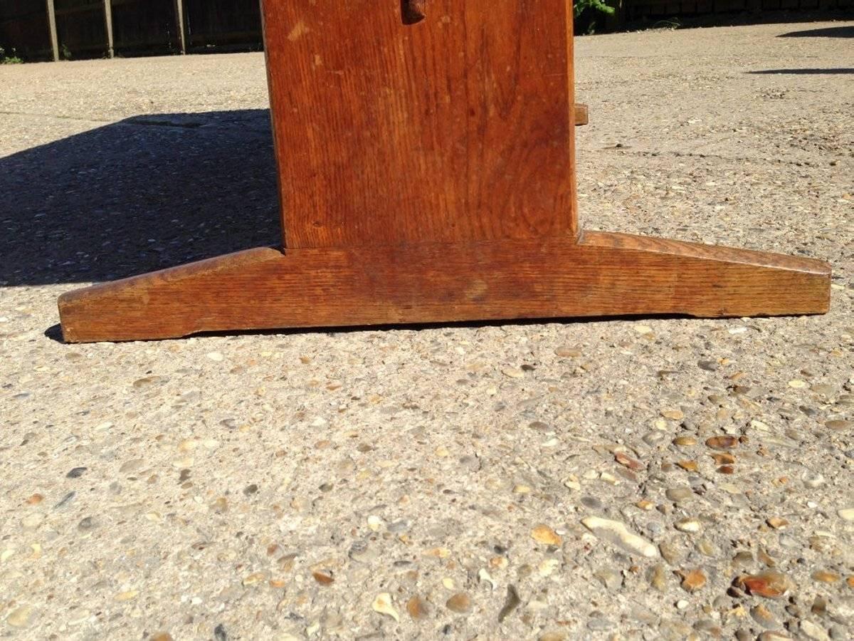 20th Century Peter Waals, Arts & Crafts Figured Oak Refectory Table with Exaggerated Feet For Sale